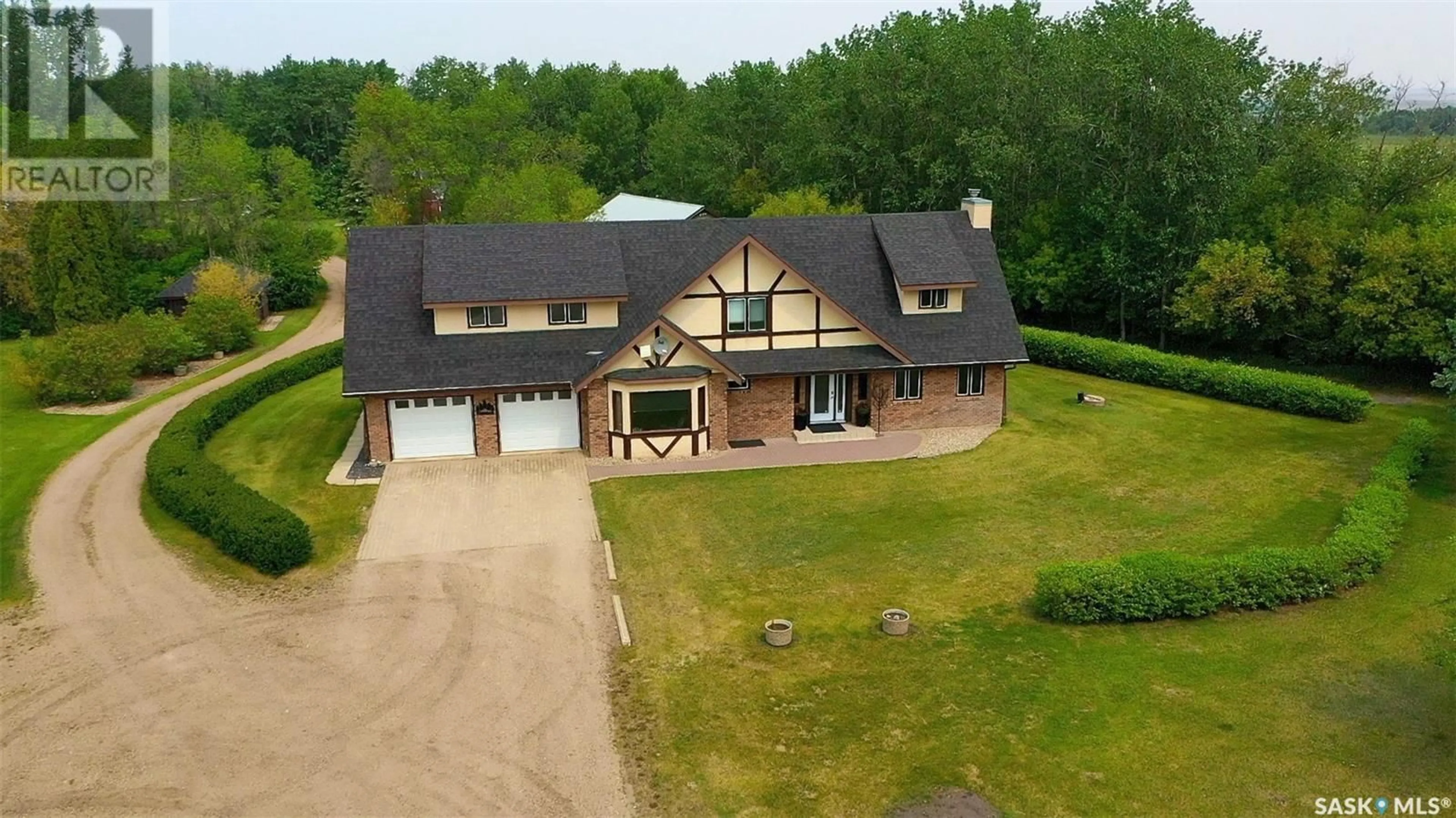 A pic from outside/outdoor area/front of a property/back of a property/a pic from drone, unknown for WALSH ACREAGE, Orkney Rm No. 244 Saskatchewan S3N4K1