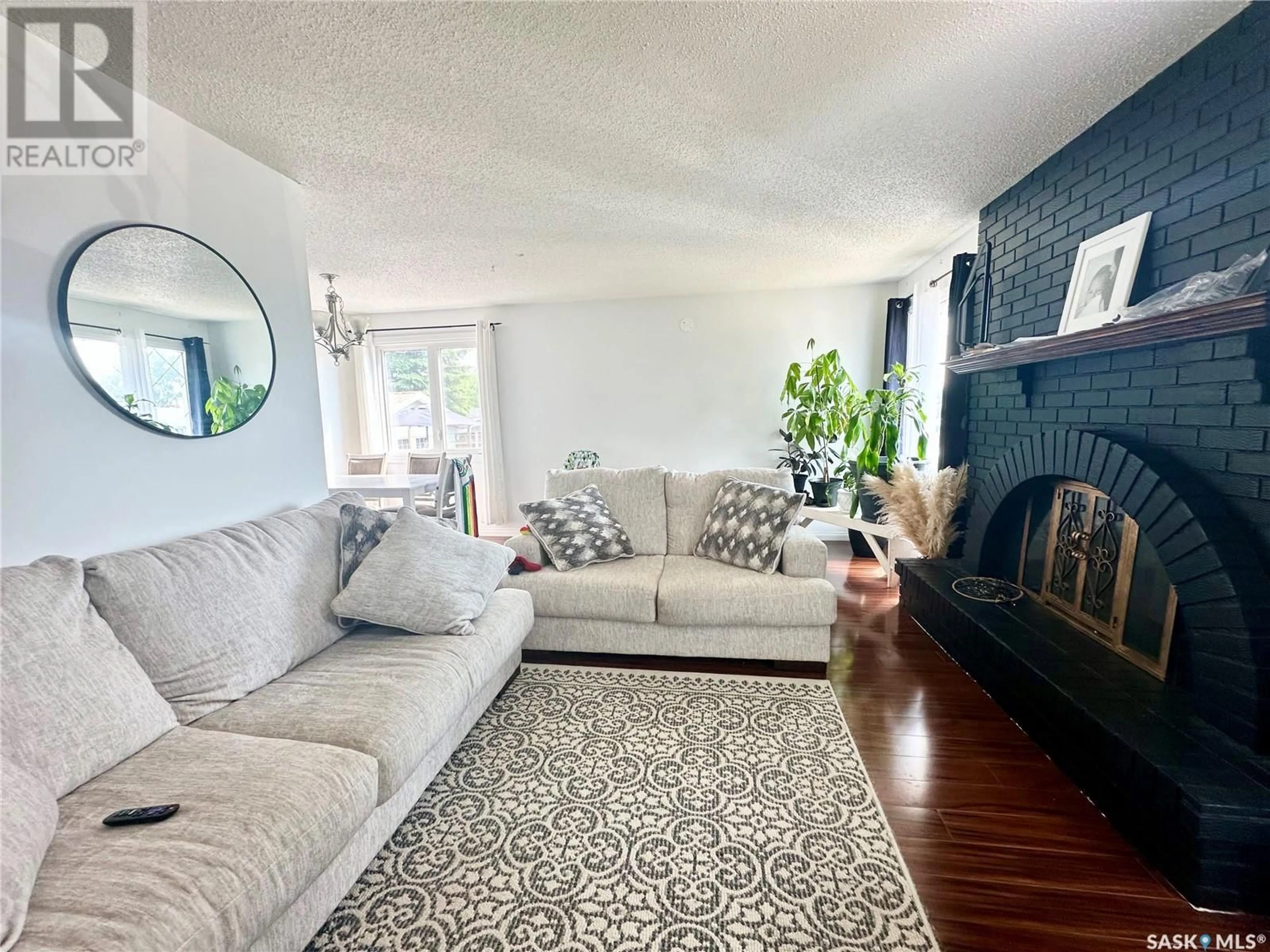 Living room with furniture, unknown for 9013 MITCHELL AVENUE, North Battleford Saskatchewan S9A3J6