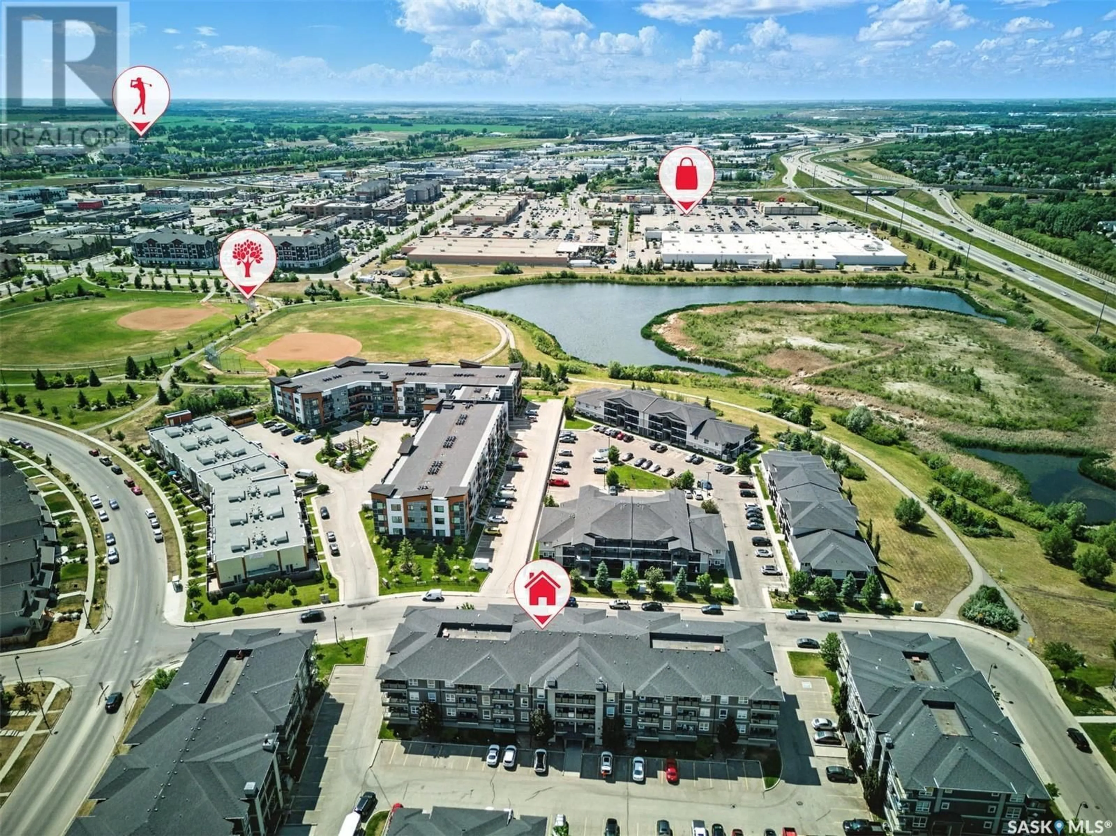 A pic from outside/outdoor area/front of a property/back of a property/a pic from drone, water/lake/river/ocean view for 110 - 5202 WILLIS CRESCENT, Saskatoon Saskatchewan S7T0N5