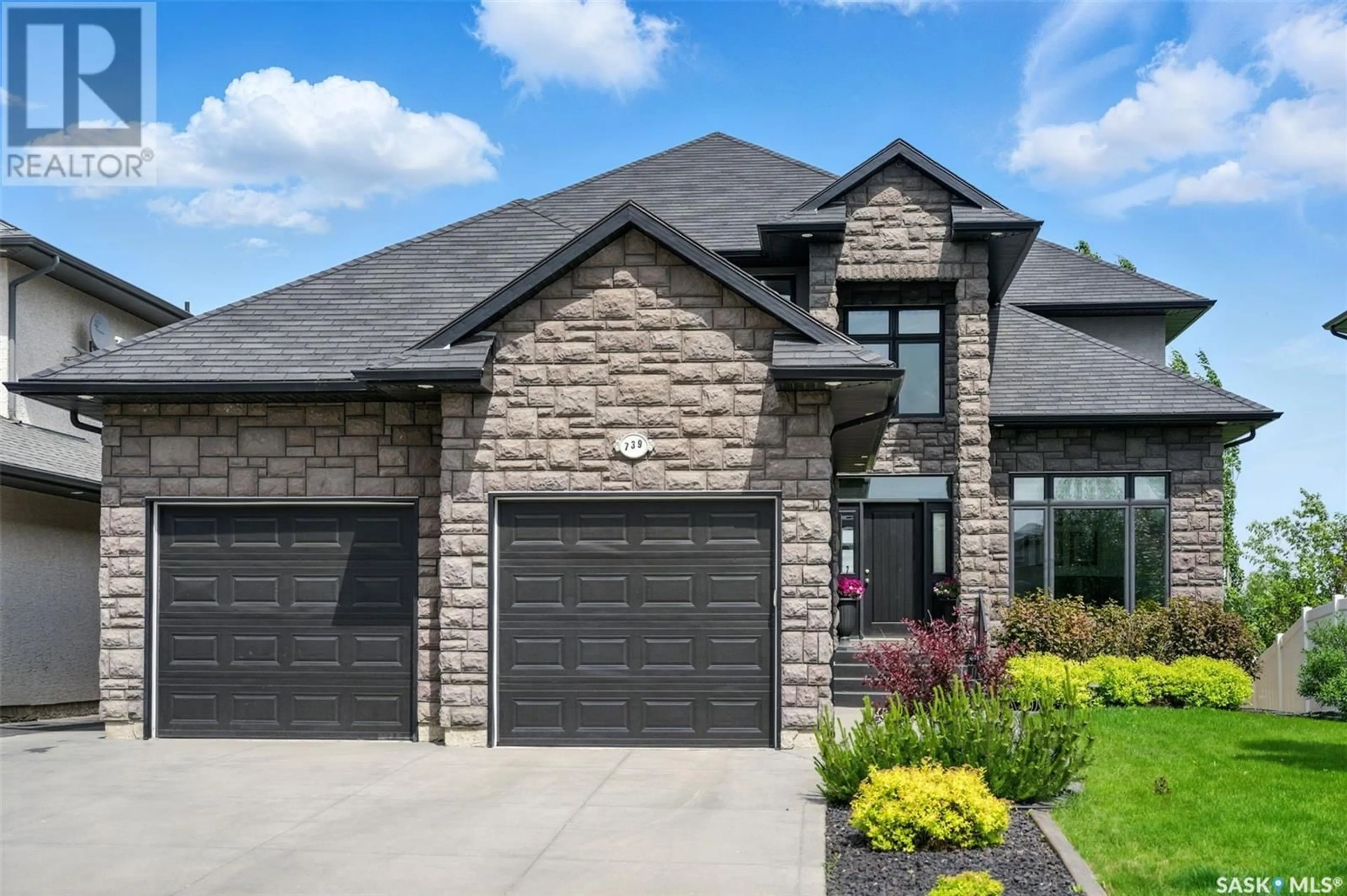 Home with brick exterior material, street for 739 BEECHDALE WAY, Saskatoon Saskatchewan S7V0A5