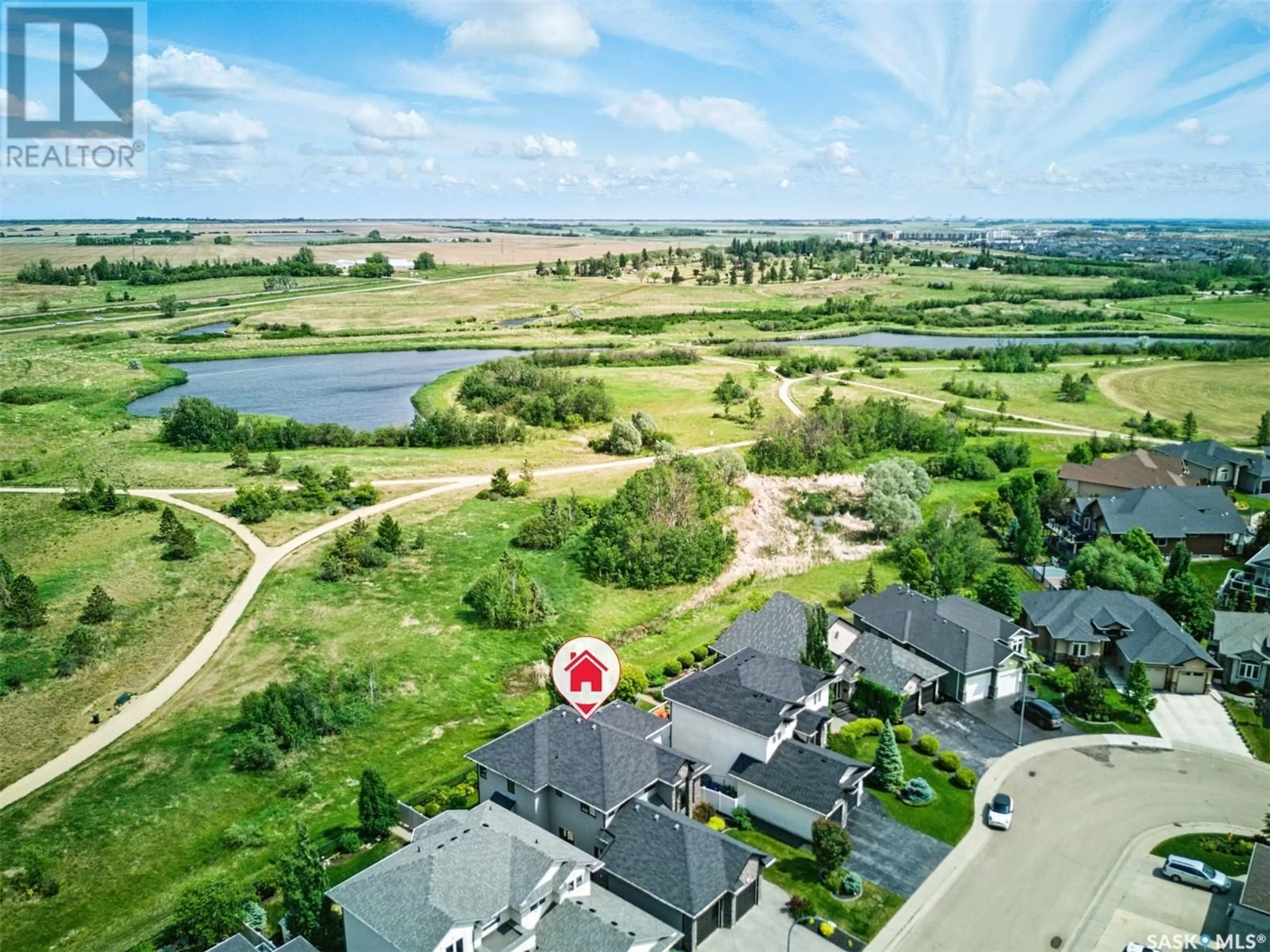 A pic from outside/outdoor area/front of a property/back of a property/a pic from drone, water/lake/river/ocean view for 739 BEECHDALE WAY, Saskatoon Saskatchewan S7V0A5