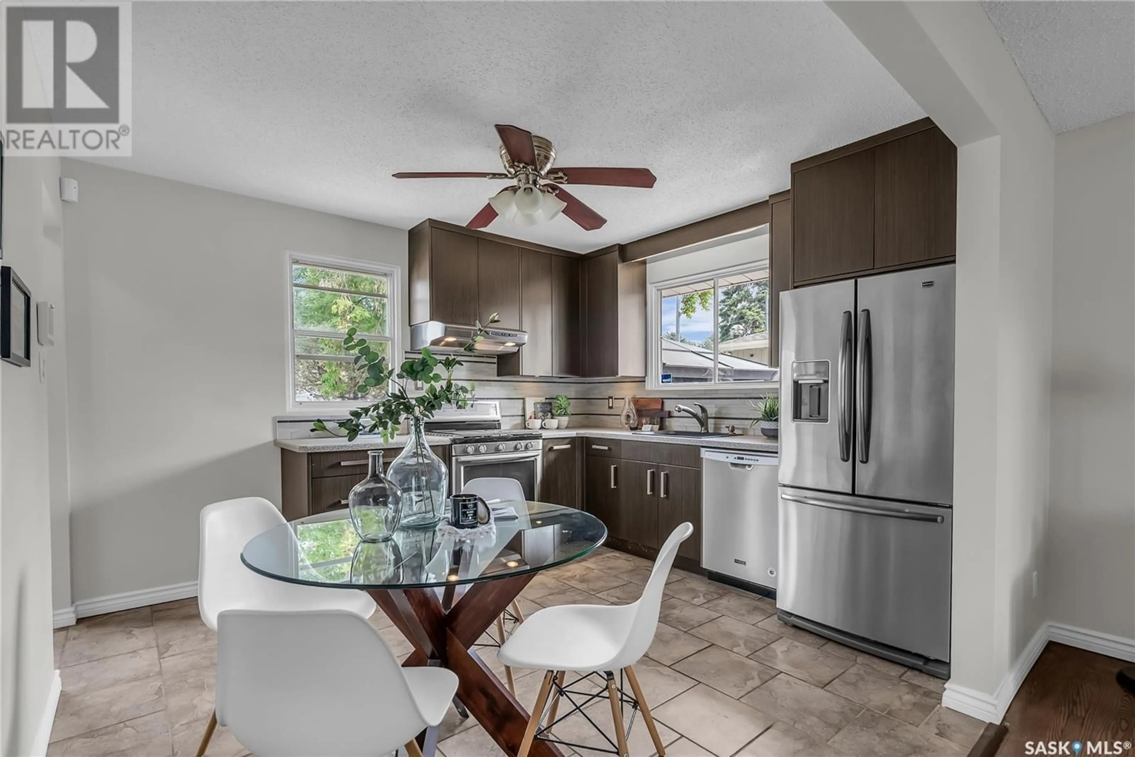 Open concept kitchen, ceramic/tile floor for 102 GROSVENOR CRESCENT, Saskatoon Saskatchewan S7J2S2