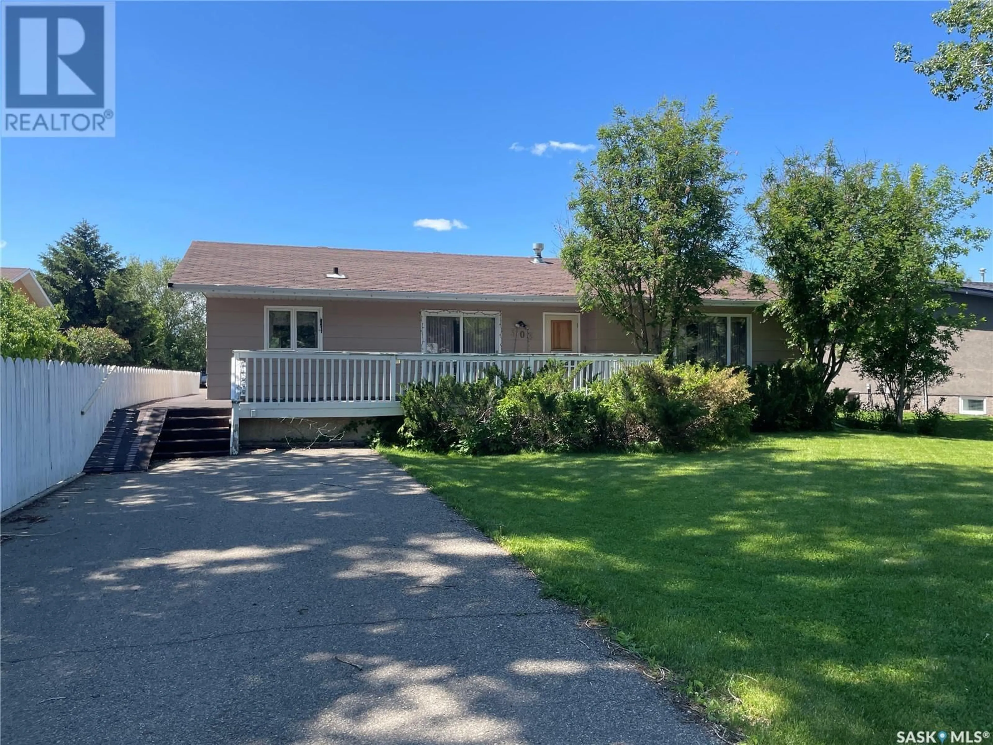 A pic from outside/outdoor area/front of a property/back of a property/a pic from drone, street for 303 21 HIGHWAY, Maple Creek Saskatchewan S0N1N0