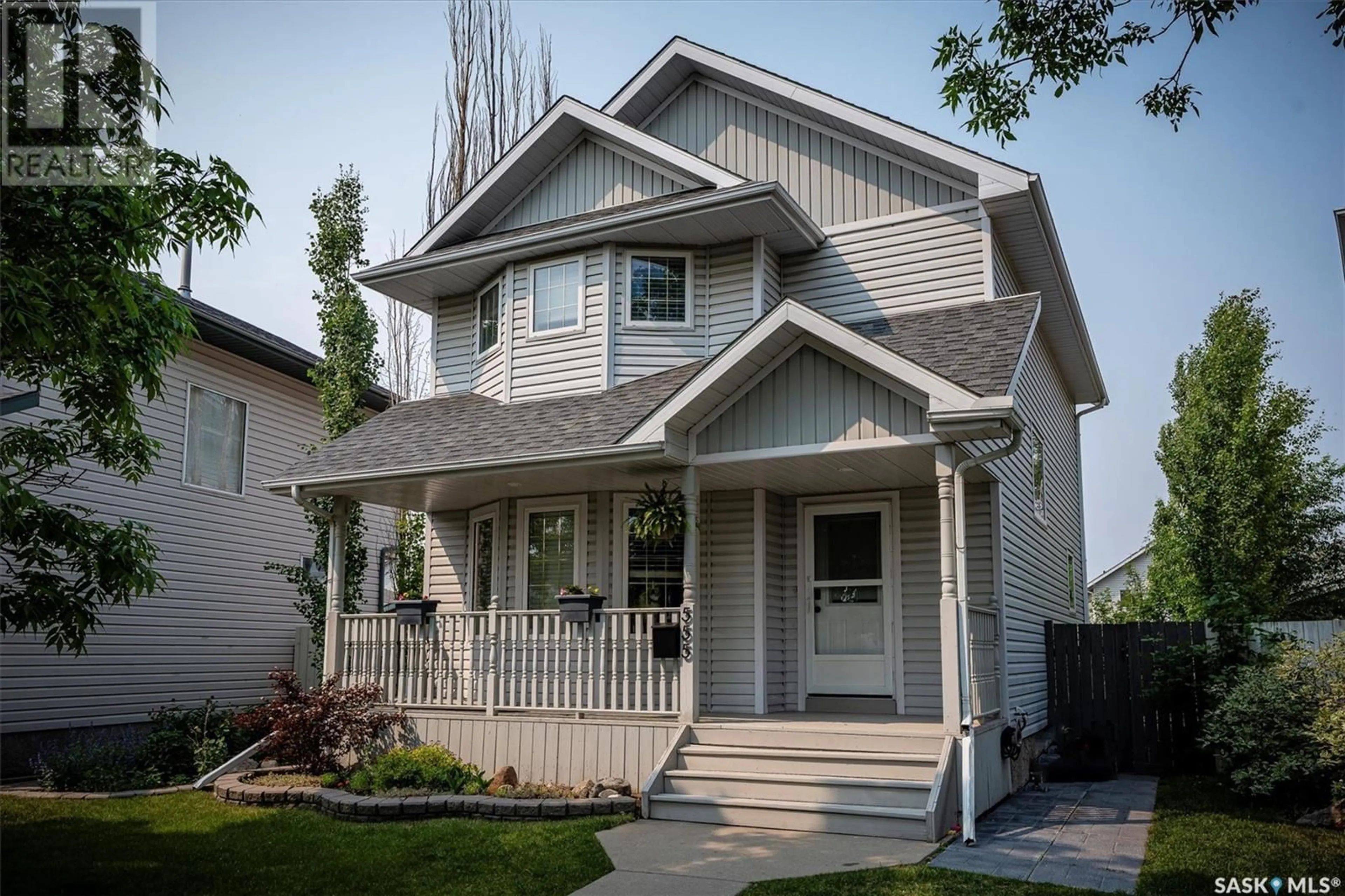 Home with vinyl exterior material, street for 555 CARTER WAY, Saskatoon Saskatchewan S7L7K5