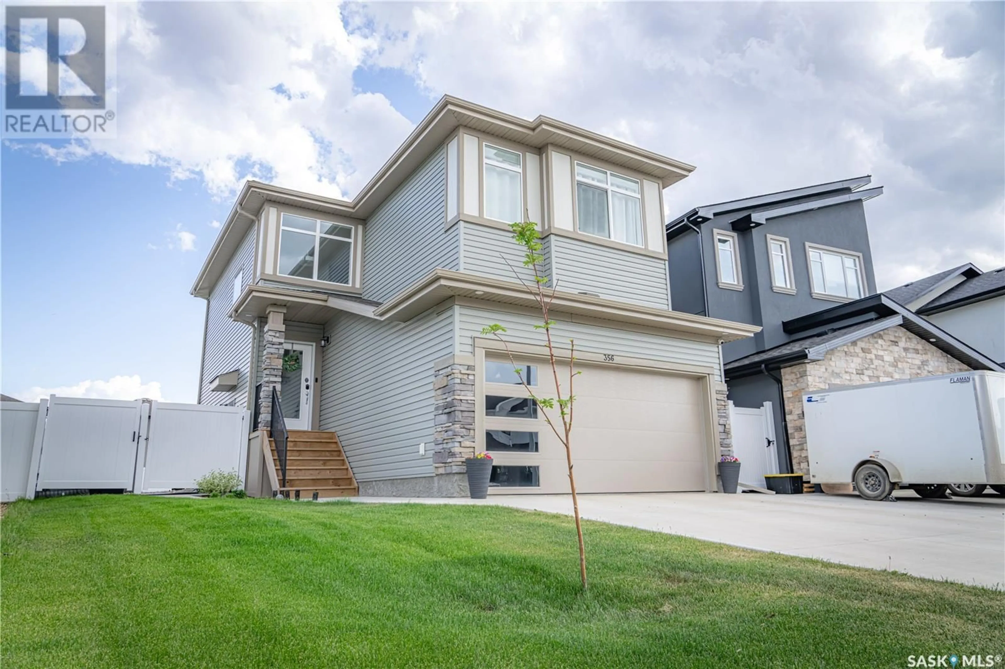 Home with vinyl exterior material, street for 356 BARRETT STREET, Saskatoon Saskatchewan S7W1E7