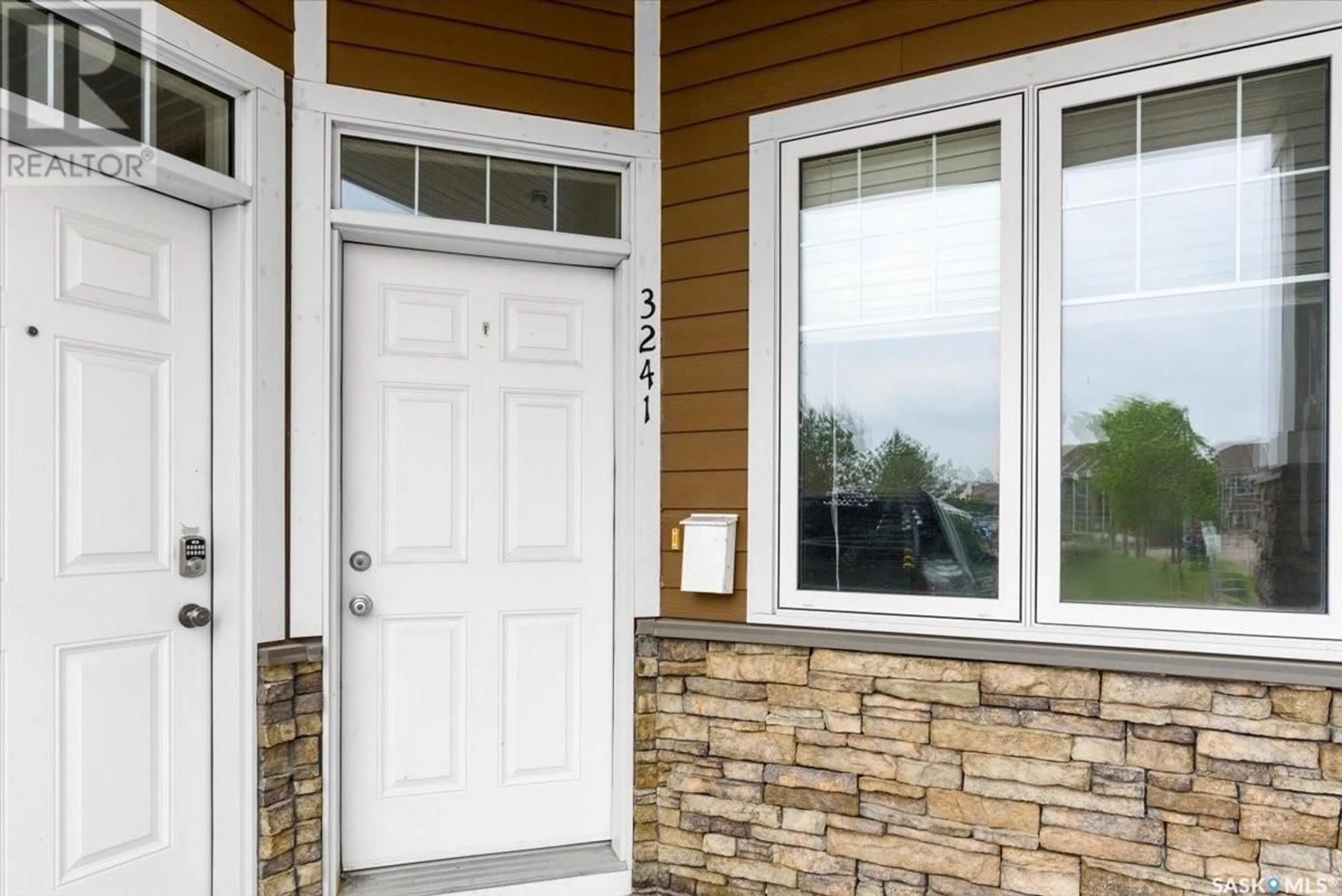 Home with vinyl exterior material, street for 3241 GREEN BANK ROAD, Regina Saskatchewan S4V2Z6