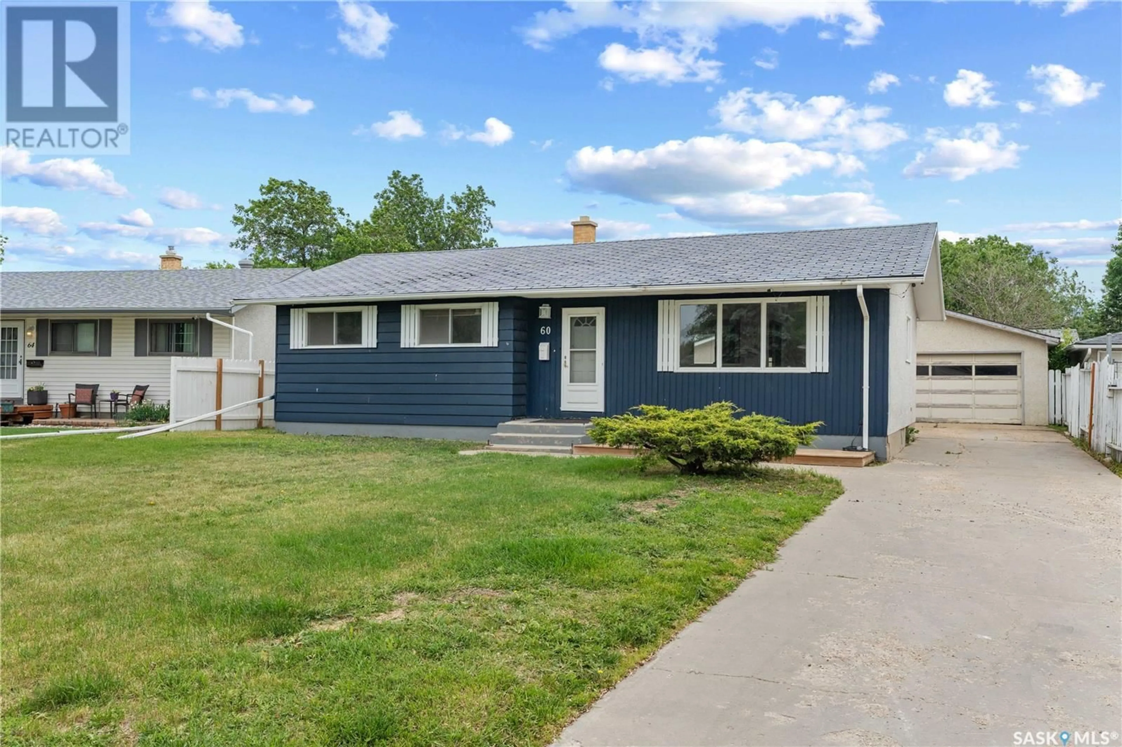 Home with vinyl exterior material, street for 60 RITCHIE CRESCENT, Regina Saskatchewan S4R5A4