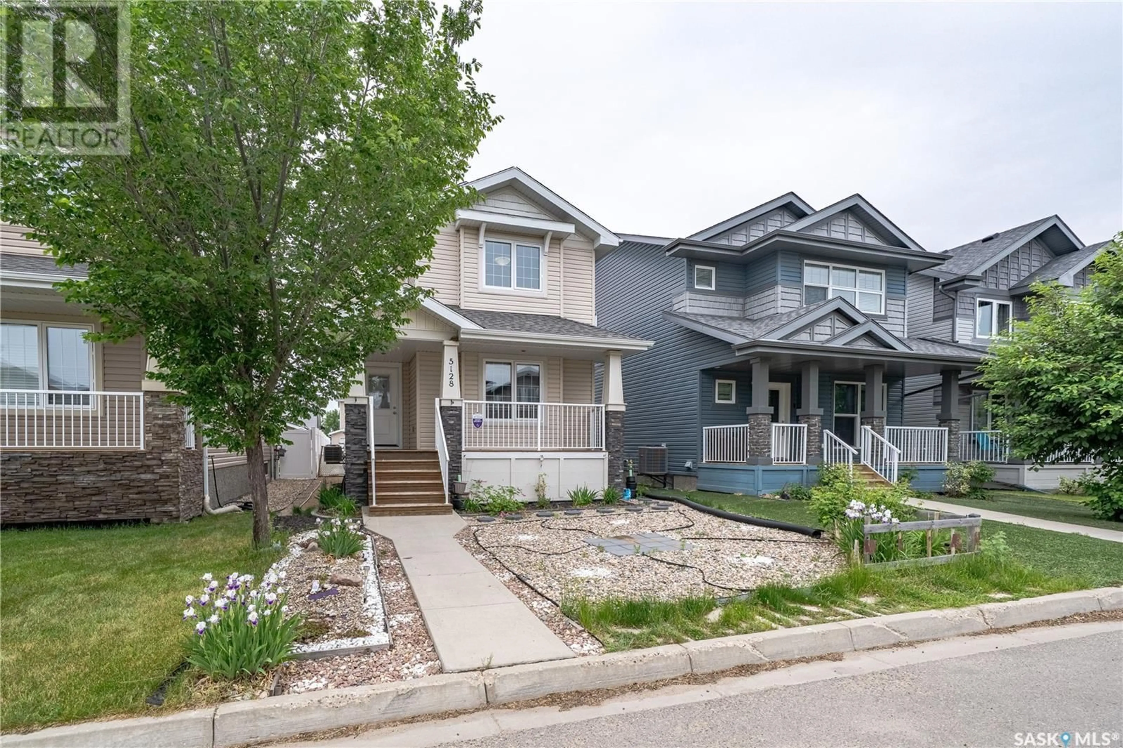 Home with vinyl exterior material, street for 5128 AERIAL CRESCENT, Regina Saskatchewan S4W0C8