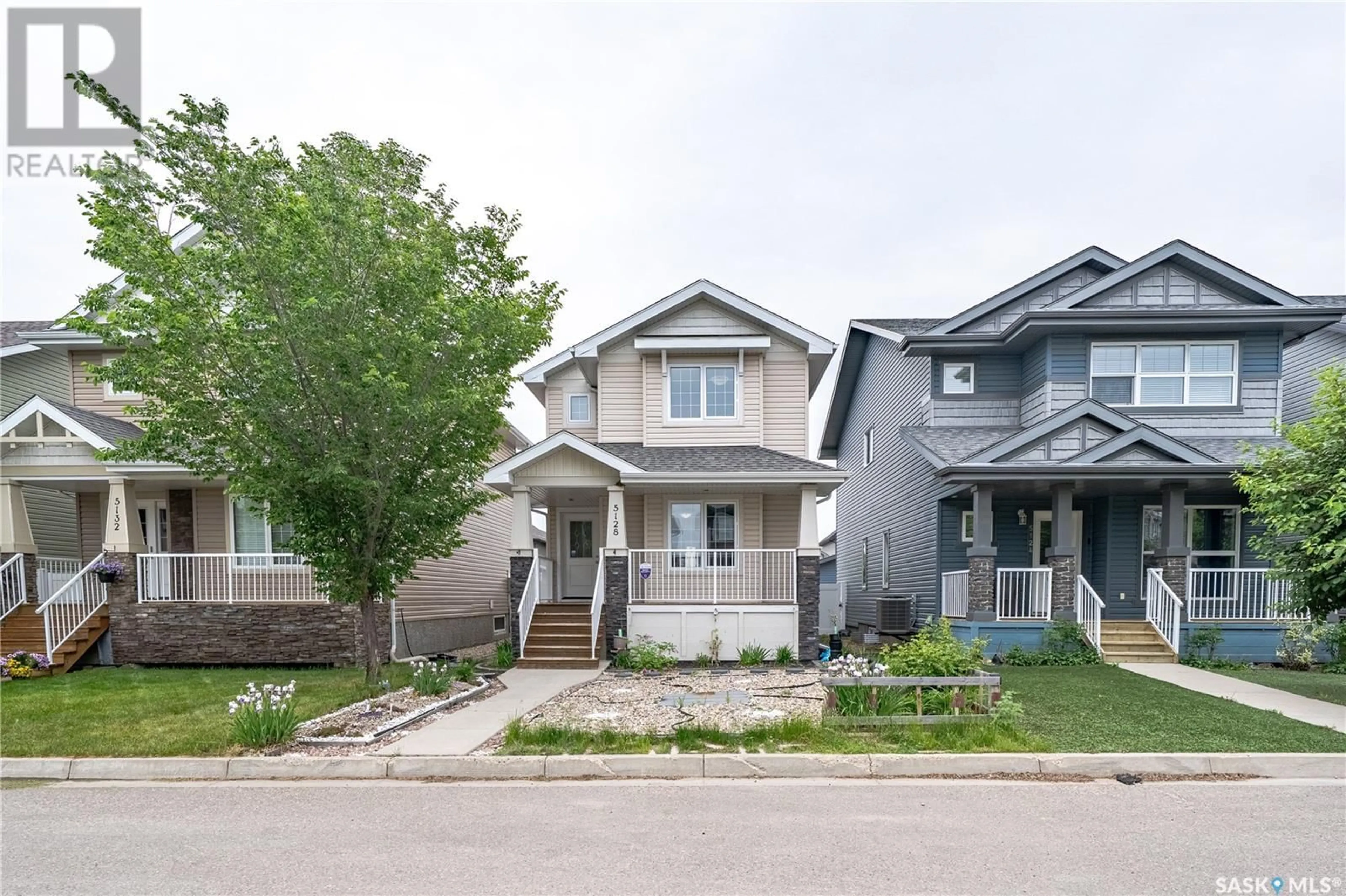 Home with vinyl exterior material, street for 5128 AERIAL CRESCENT, Regina Saskatchewan S4W0C8