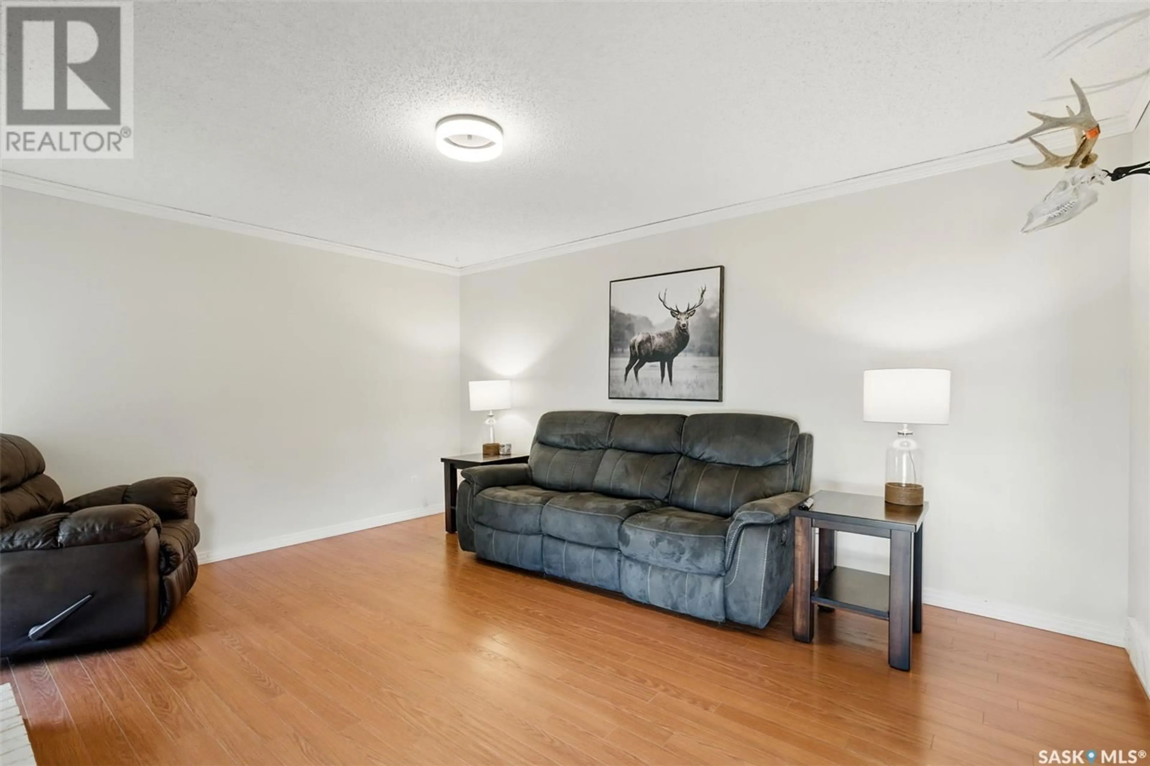 Living room with furniture, unknown for 103 O'REGAN CRESCENT, Saskatoon Saskatchewan S7L6P1