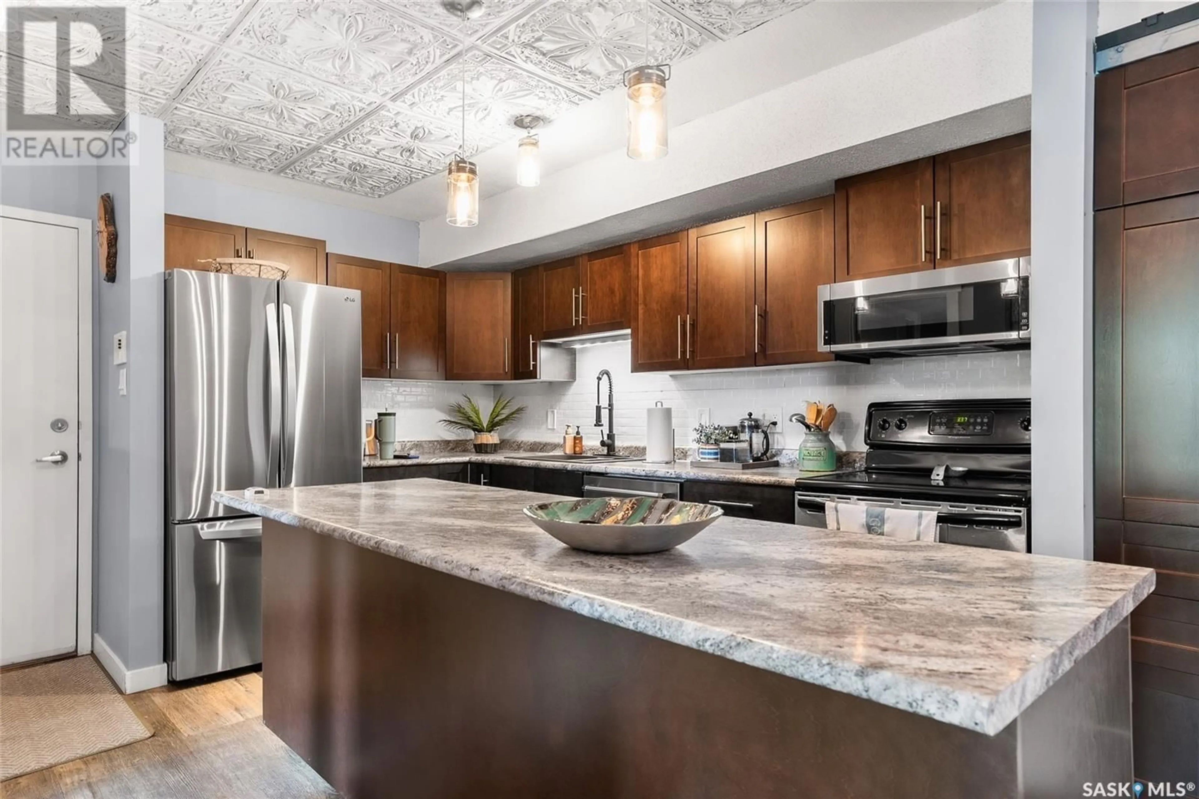 Open concept kitchen, unknown for 203 - 215 KINGSMERE BOULEVARD, Saskatoon Saskatchewan S7J4J6