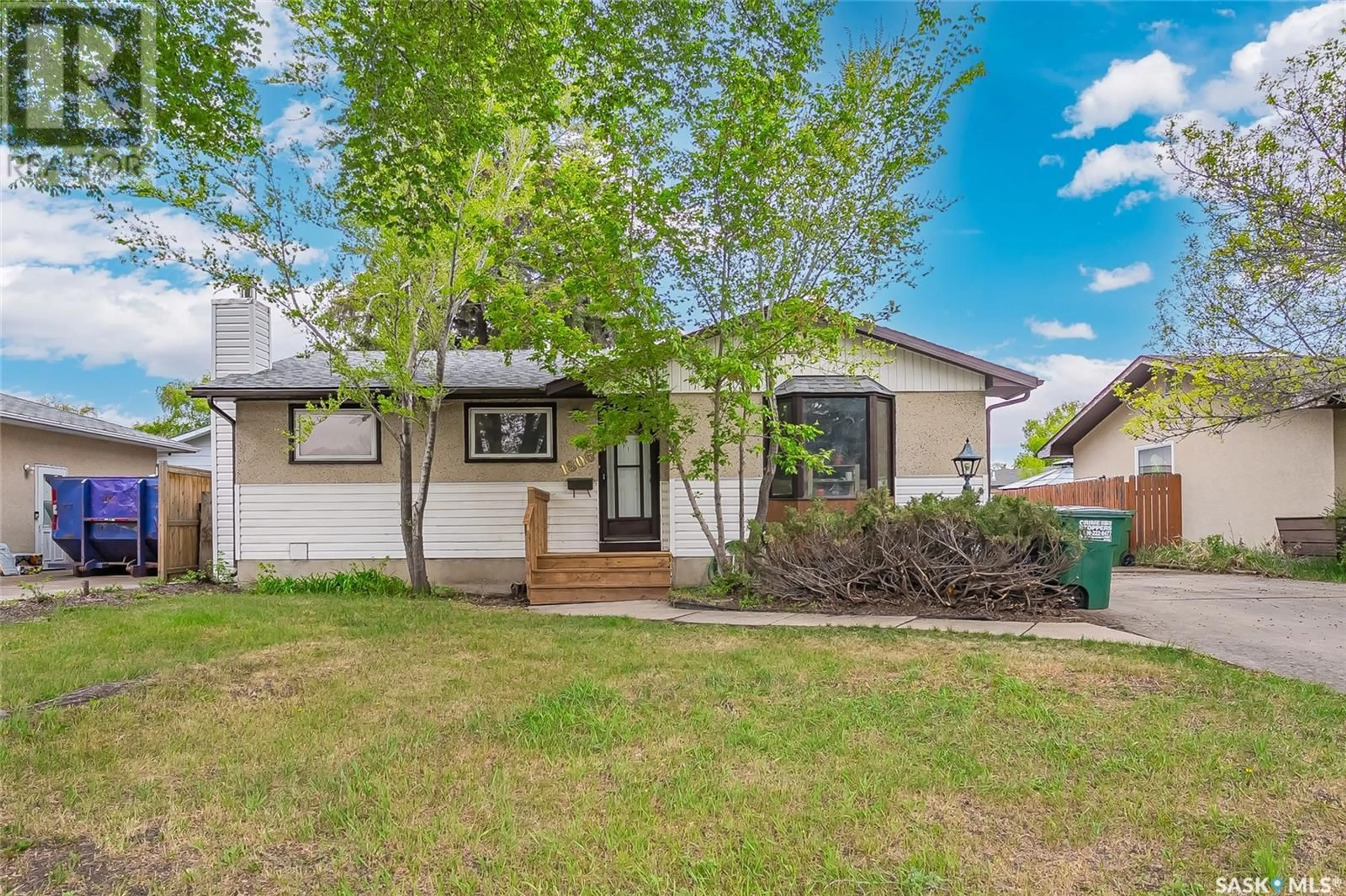 Home with vinyl exterior material, street for 1806 RICHARDSON ROAD, Saskatoon Saskatchewan S7L4B5