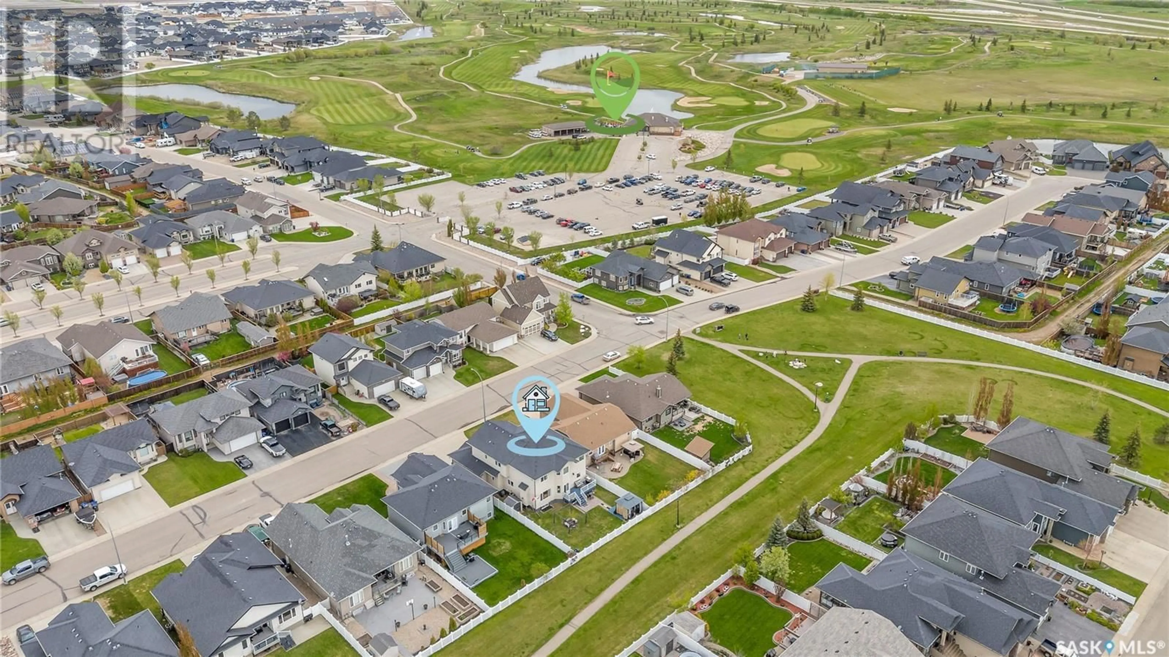A pic from outside/outdoor area/front of a property/back of a property/a pic from drone, street for 317 NICKLAUS DRIVE, Warman Saskatchewan S0K4S0