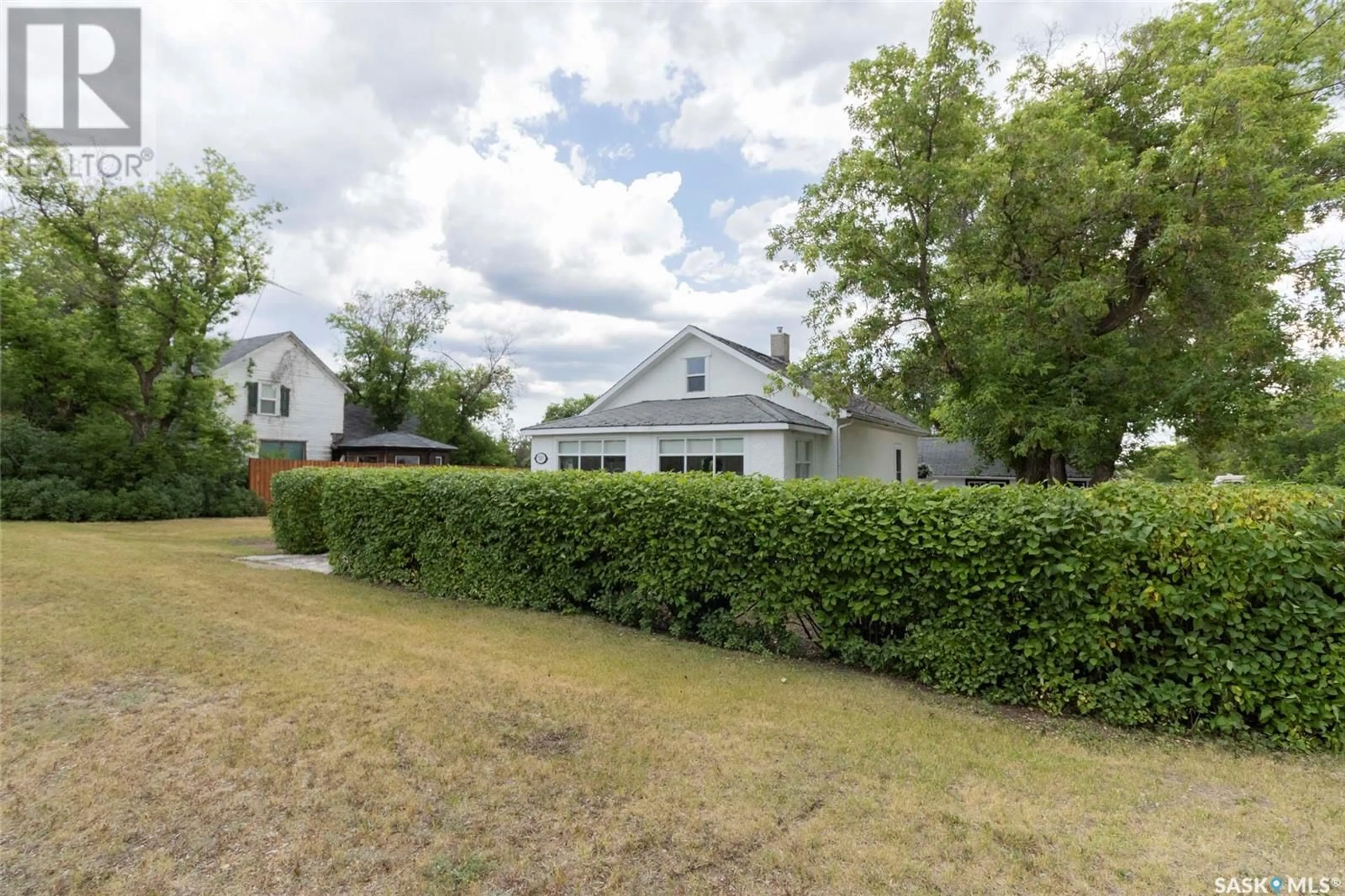A pic from outside/outdoor area/front of a property/back of a property/a pic from drone, street for 502 3RD AVENUE, Kinley Saskatchewan S0K2E0