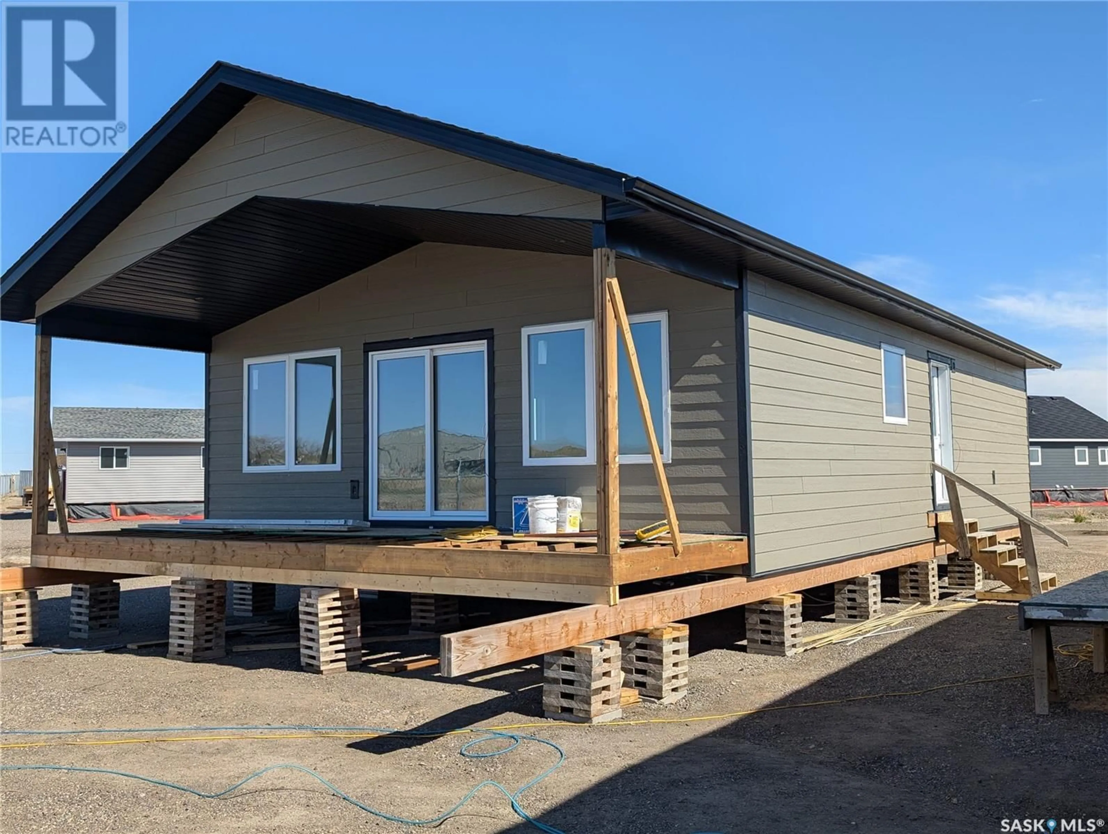 Home with vinyl exterior material, building for 78 SUNSET ACRES ROAD, Last Mountain Lake East Side Saskatchewan S0G0Z0