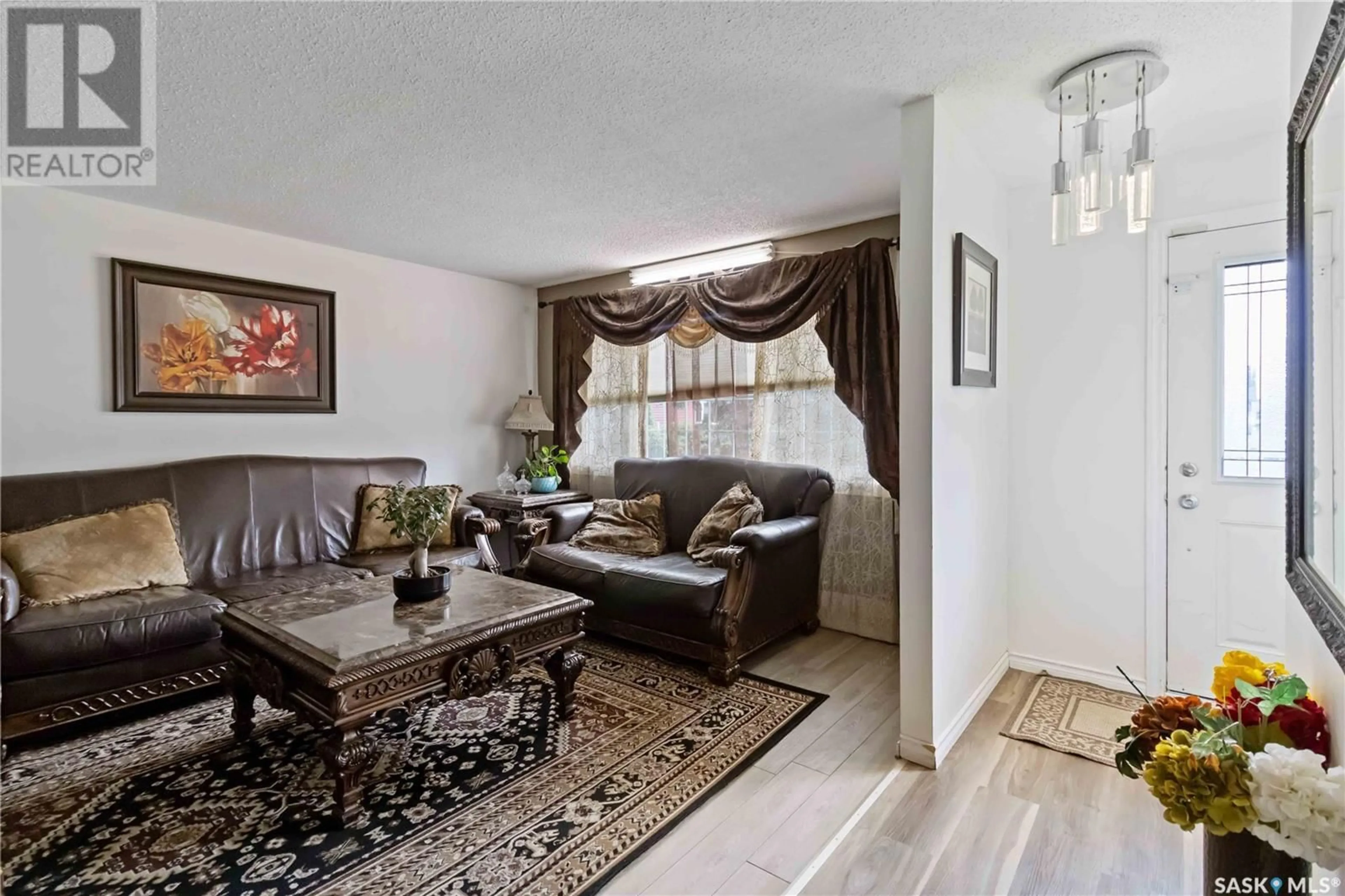 Living room with furniture, unknown for 506 SMALLWOOD CRESCENT, Saskatoon Saskatchewan S7L4S6