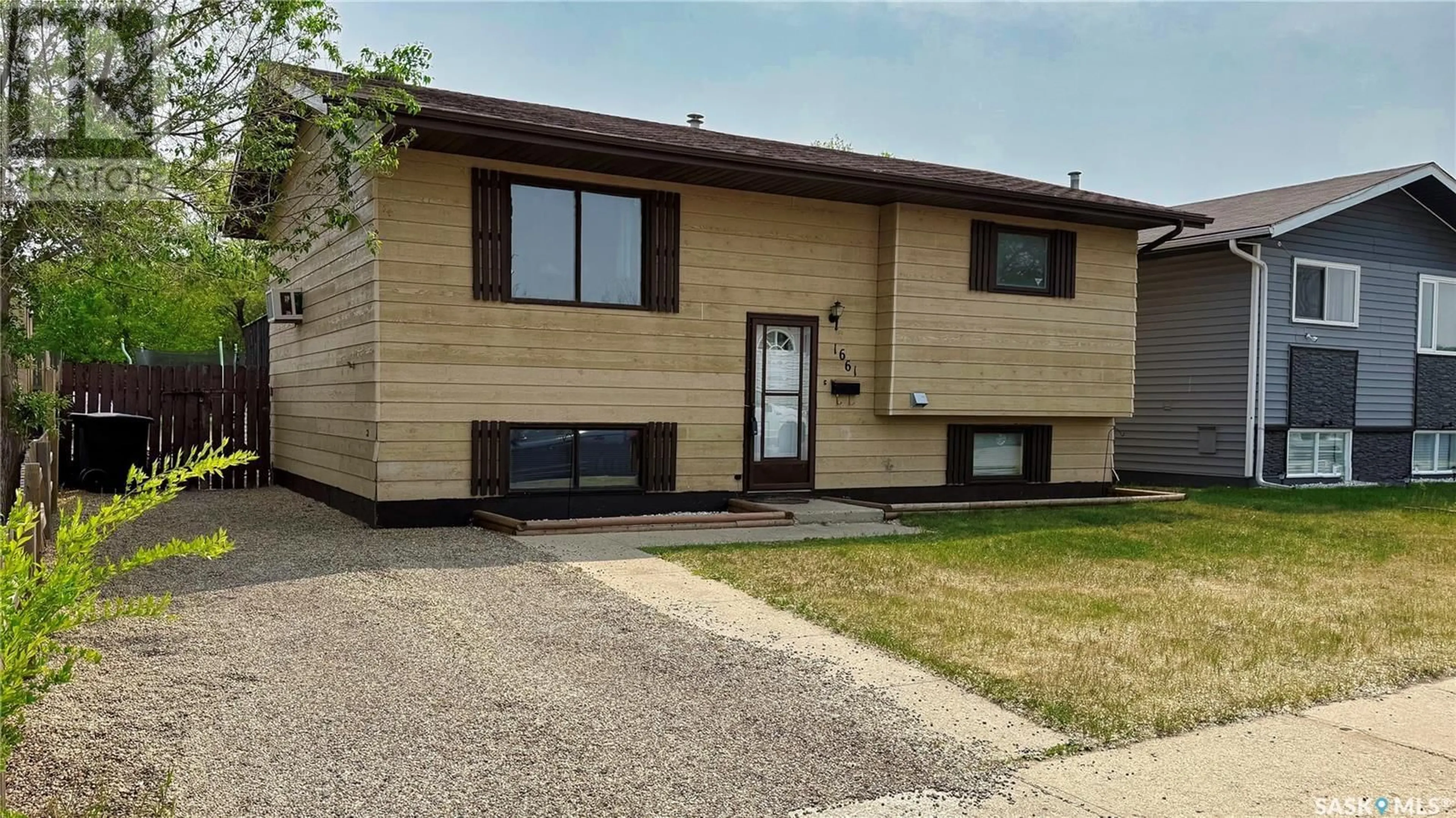 Home with vinyl exterior material, street for 1661 MUIR DRIVE, Prince Albert Saskatchewan S6V7T9