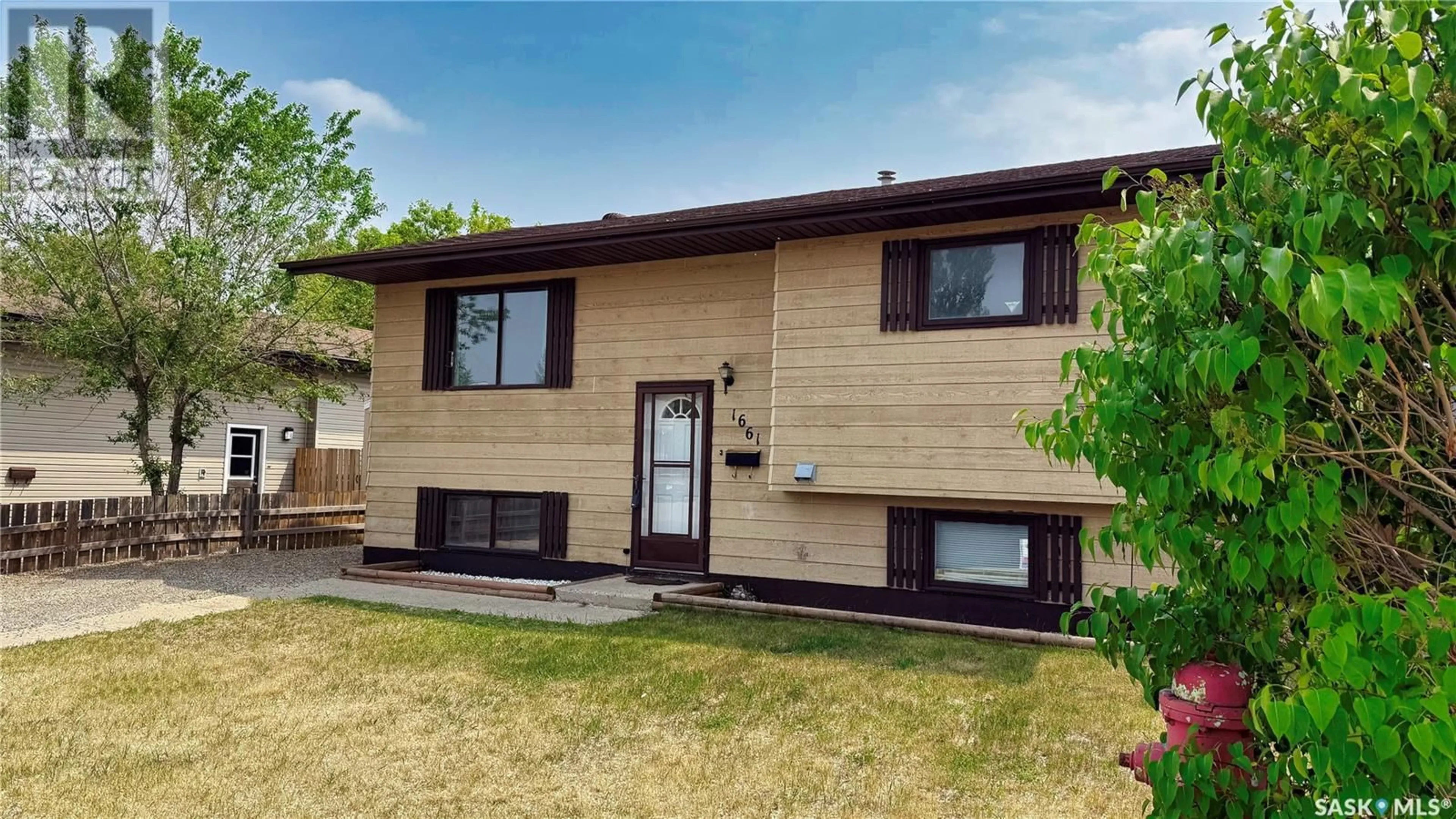 Home with vinyl exterior material, street for 1661 MUIR DRIVE, Prince Albert Saskatchewan S6V7T9