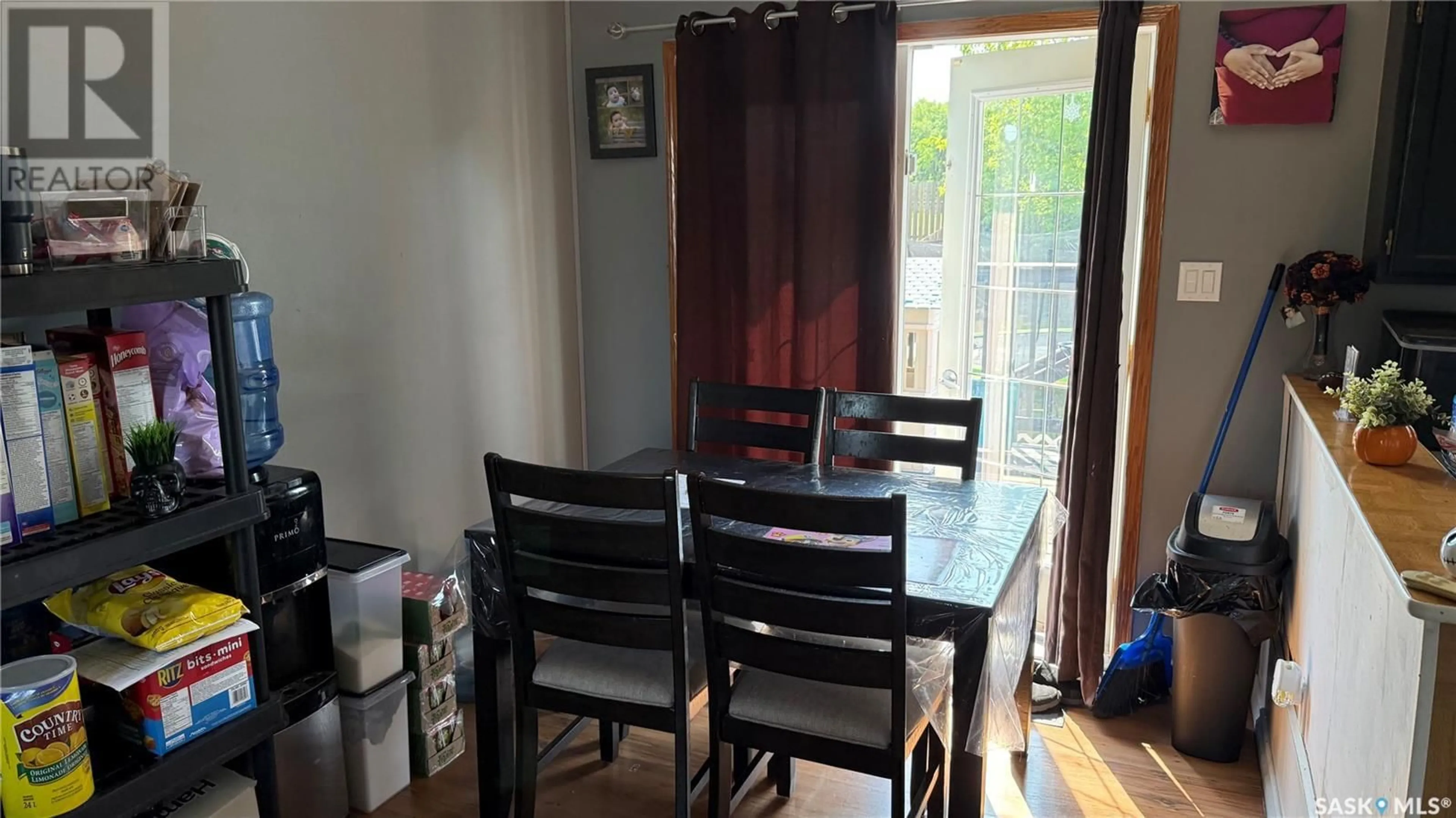 Dining room, wood/laminate floor for 1661 MUIR DRIVE, Prince Albert Saskatchewan S6V7T9
