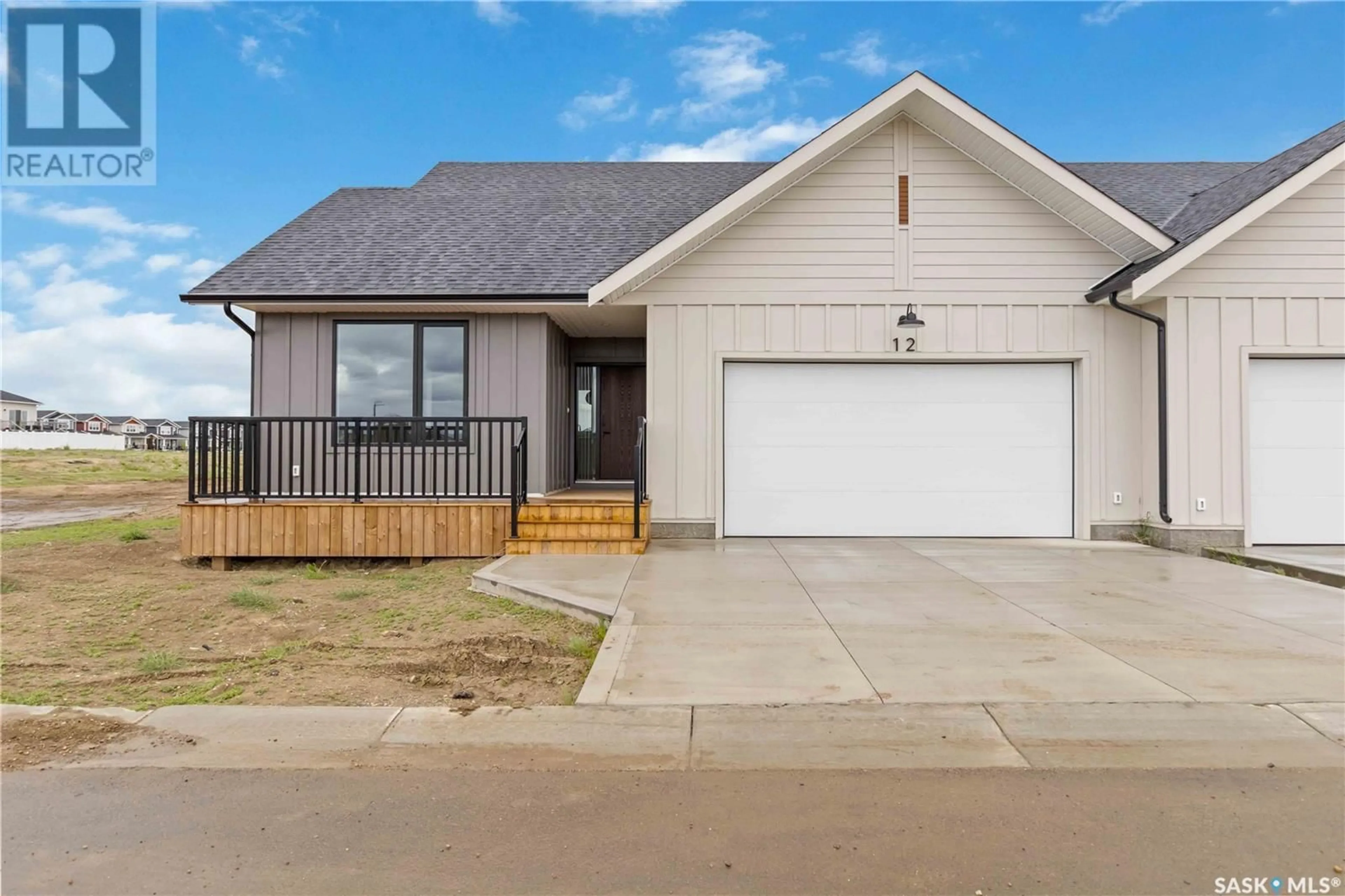 Home with vinyl exterior material, street for 25 105 HATHWAY CRESCENT, Saskatoon Saskatchewan S7V0P5