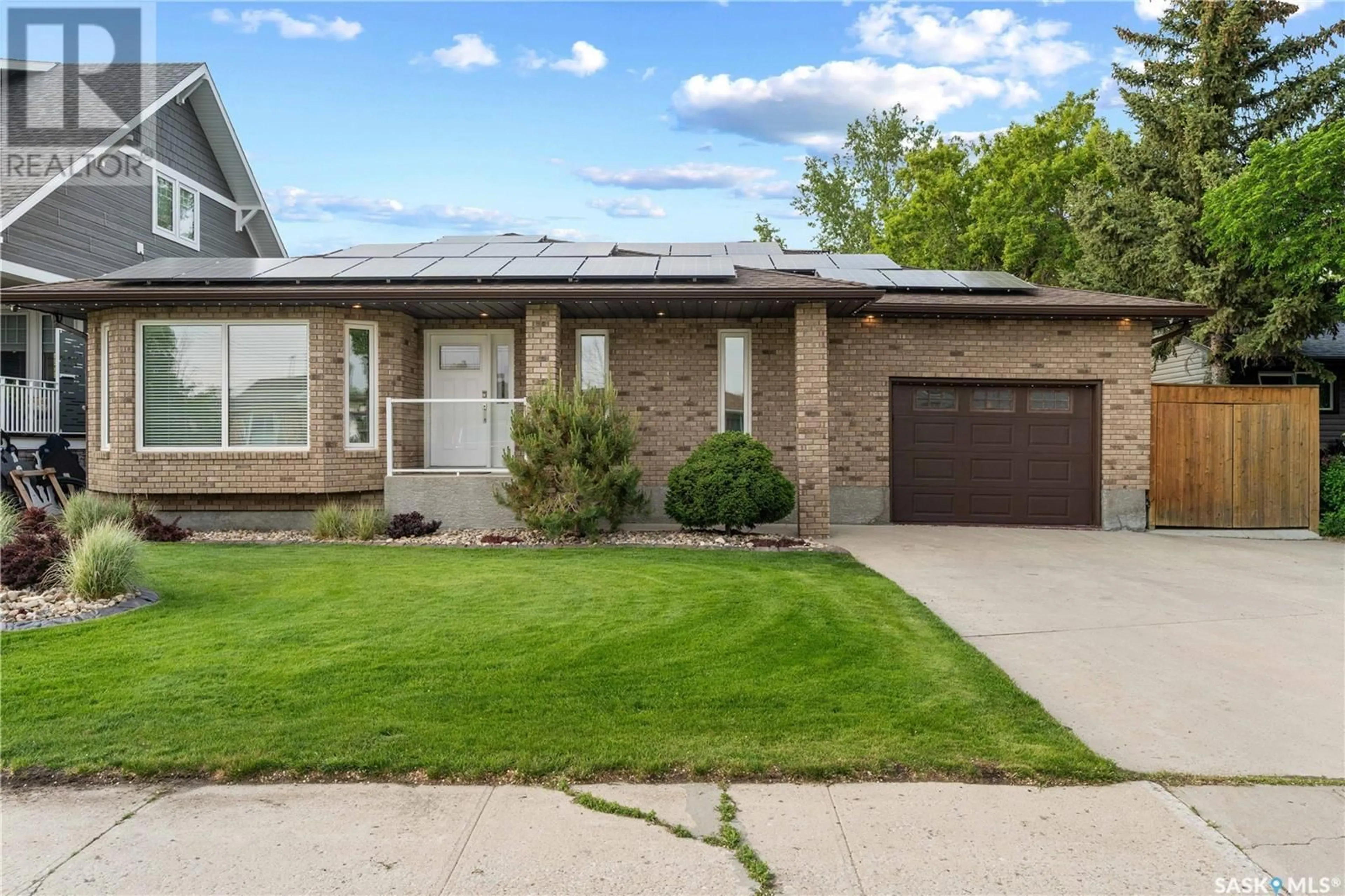 Home with brick exterior material, street for 7332 7TH AVENUE, Regina Saskatchewan S4T0T1