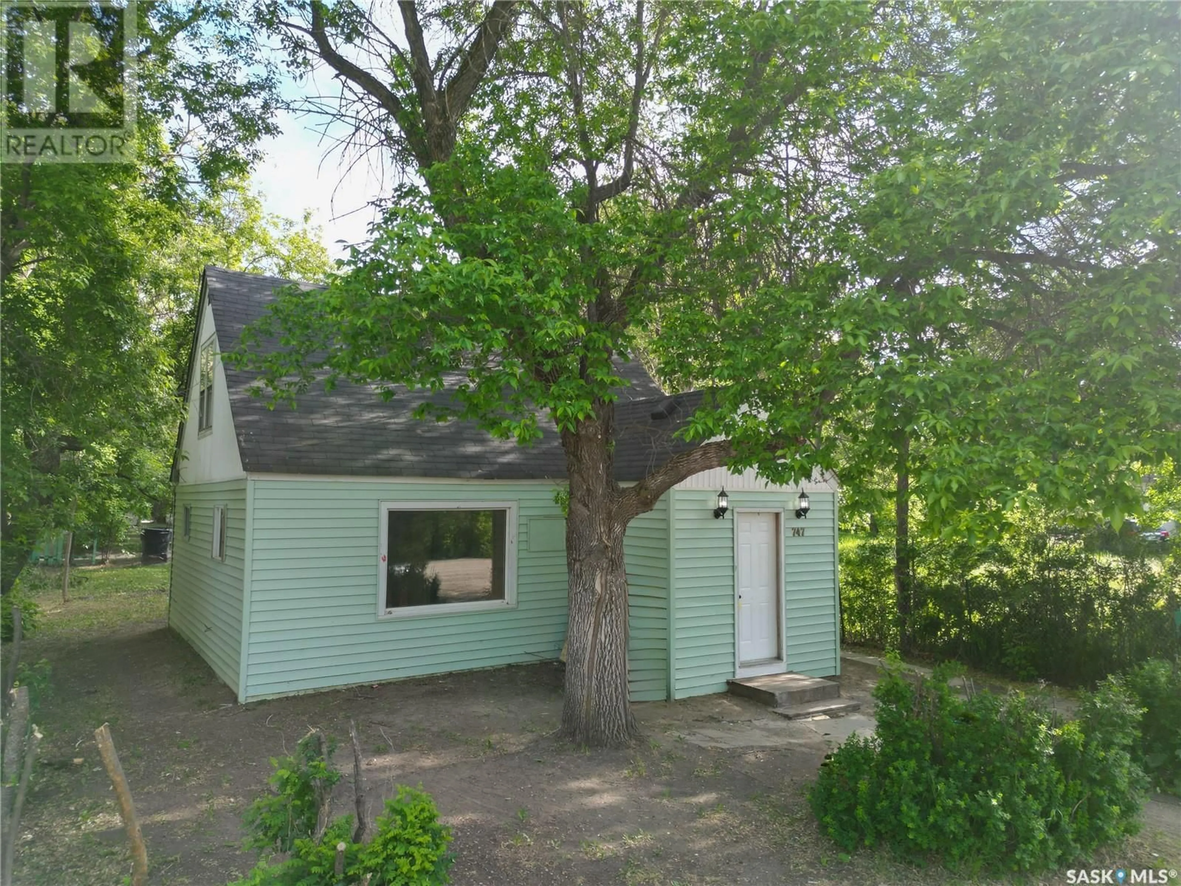 A pic from outside/outdoor area/front of a property/back of a property/a pic from drone, street for 747 12TH STREET, Prince Albert Saskatchewan S6V3C3