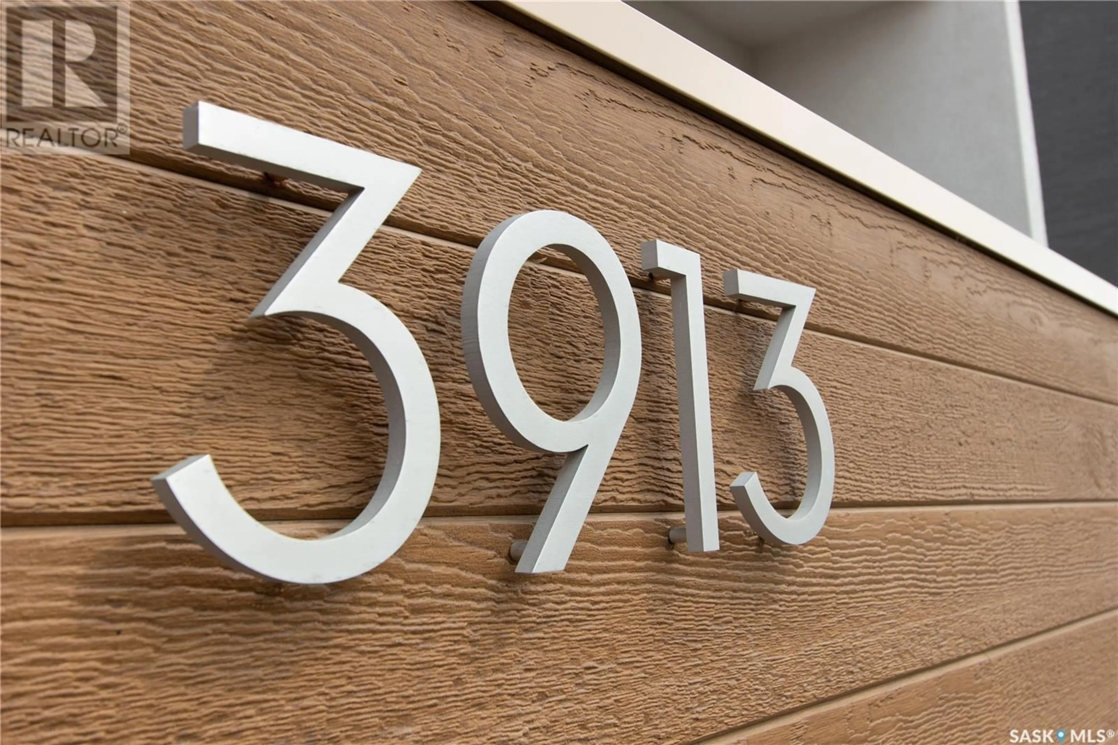 Home with vinyl exterior material, street for 3913 JAMES HILL ROAD, Regina Saskatchewan S4W0N8