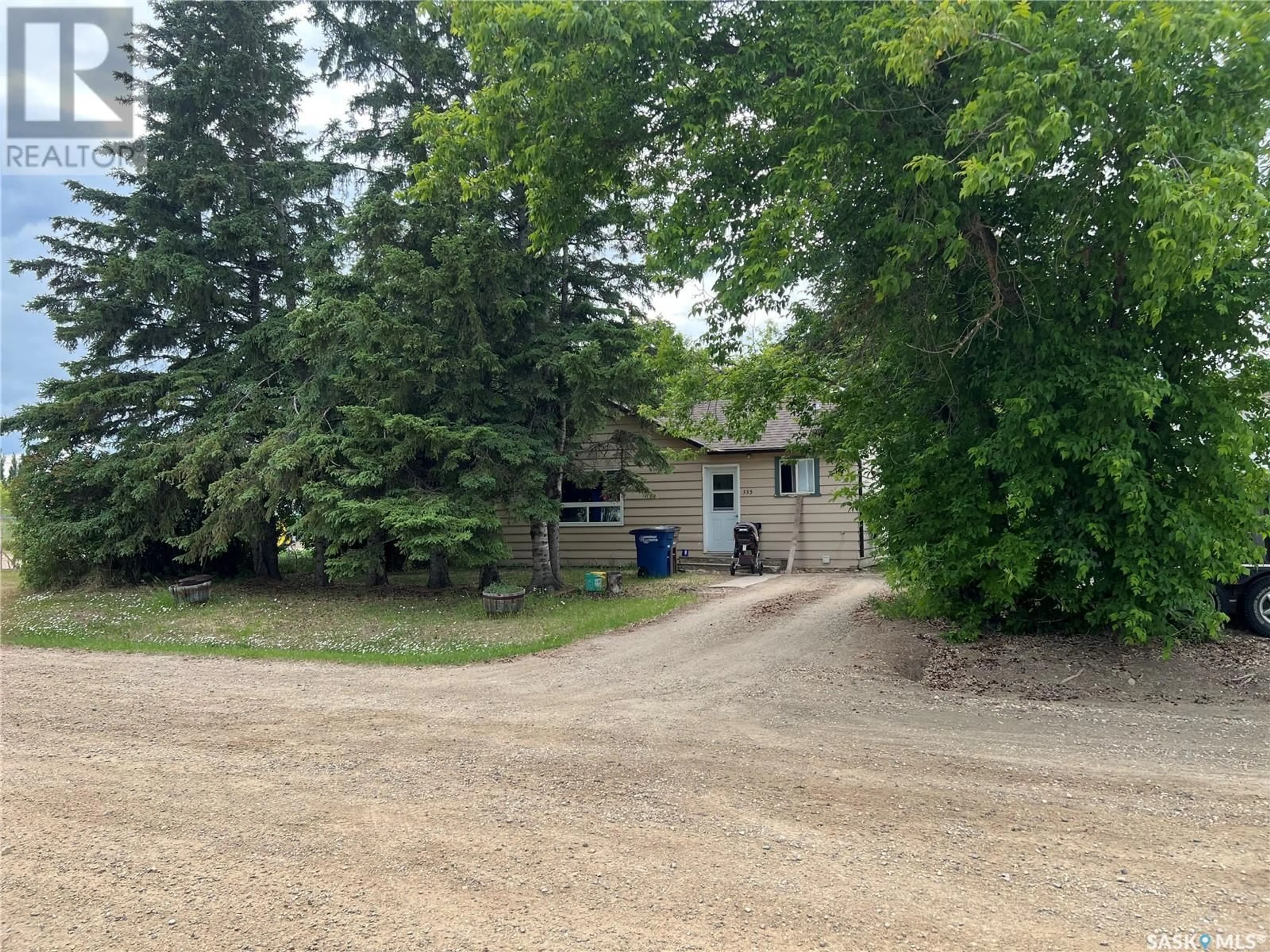 A pic from outside/outdoor area/front of a property/back of a property/a pic from drone, street for 335 1ST AVENUE, Porcupine Plain Saskatchewan S0E1H0