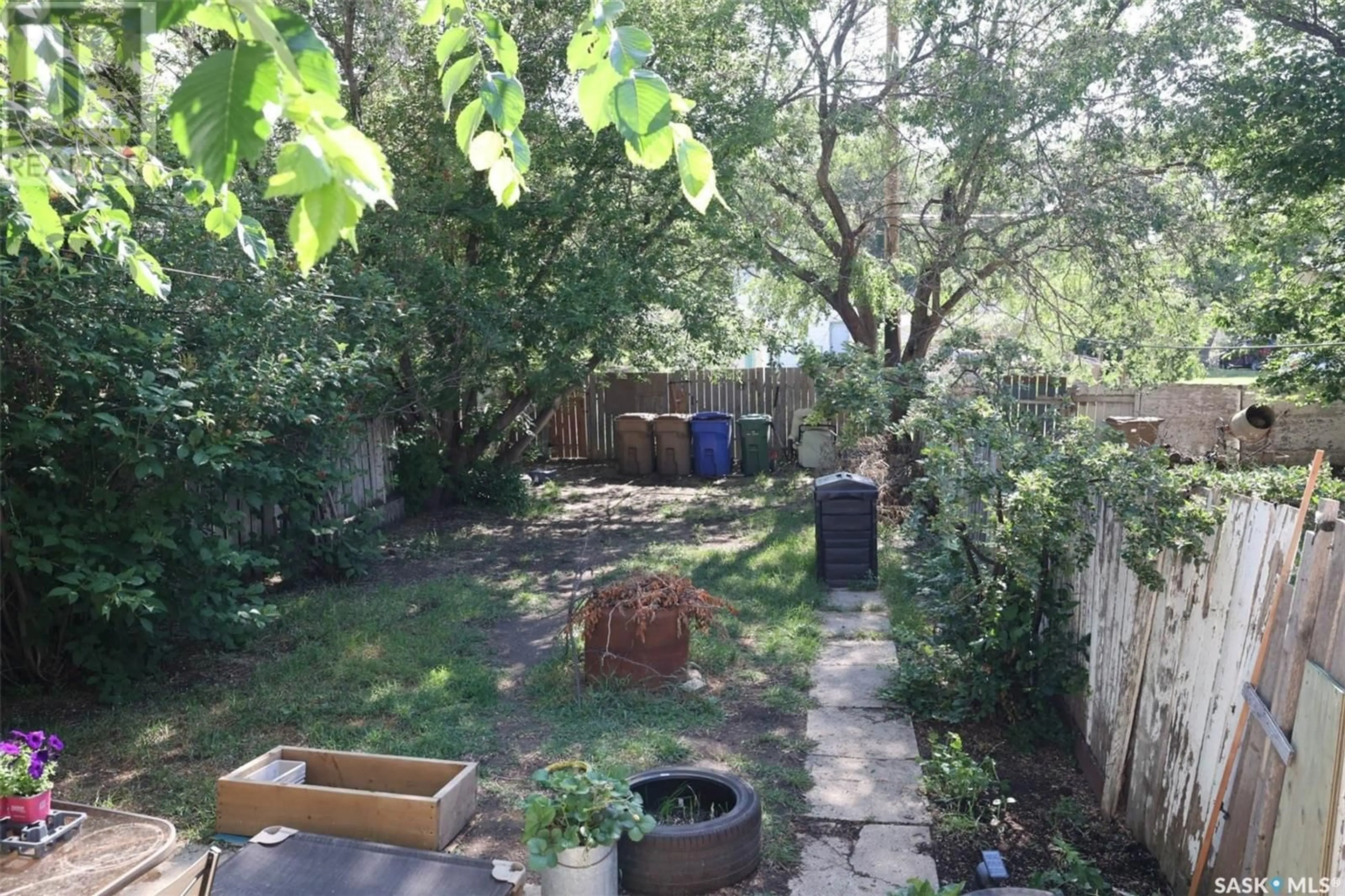 A pic from outside/outdoor area/front of a property/back of a property/a pic from drone, forest/trees view for 1243 ROBINSON STREET, Regina Saskatchewan S4T2N3