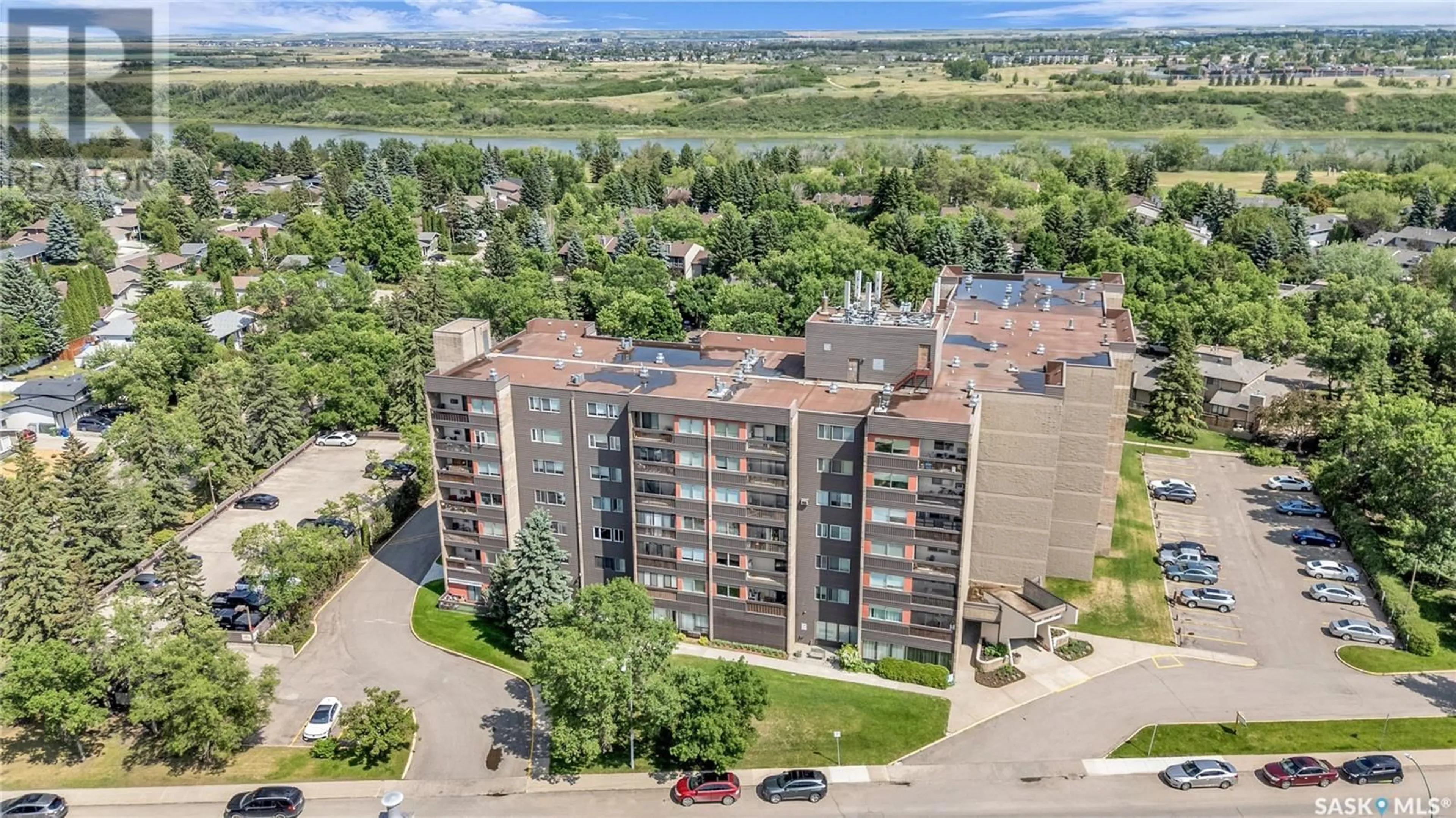 A pic from outside/outdoor area/front of a property/back of a property/a pic from drone, water/lake/river/ocean view for 106A 351 SAGUENAY DRIVE, Saskatoon Saskatchewan S7K5T4