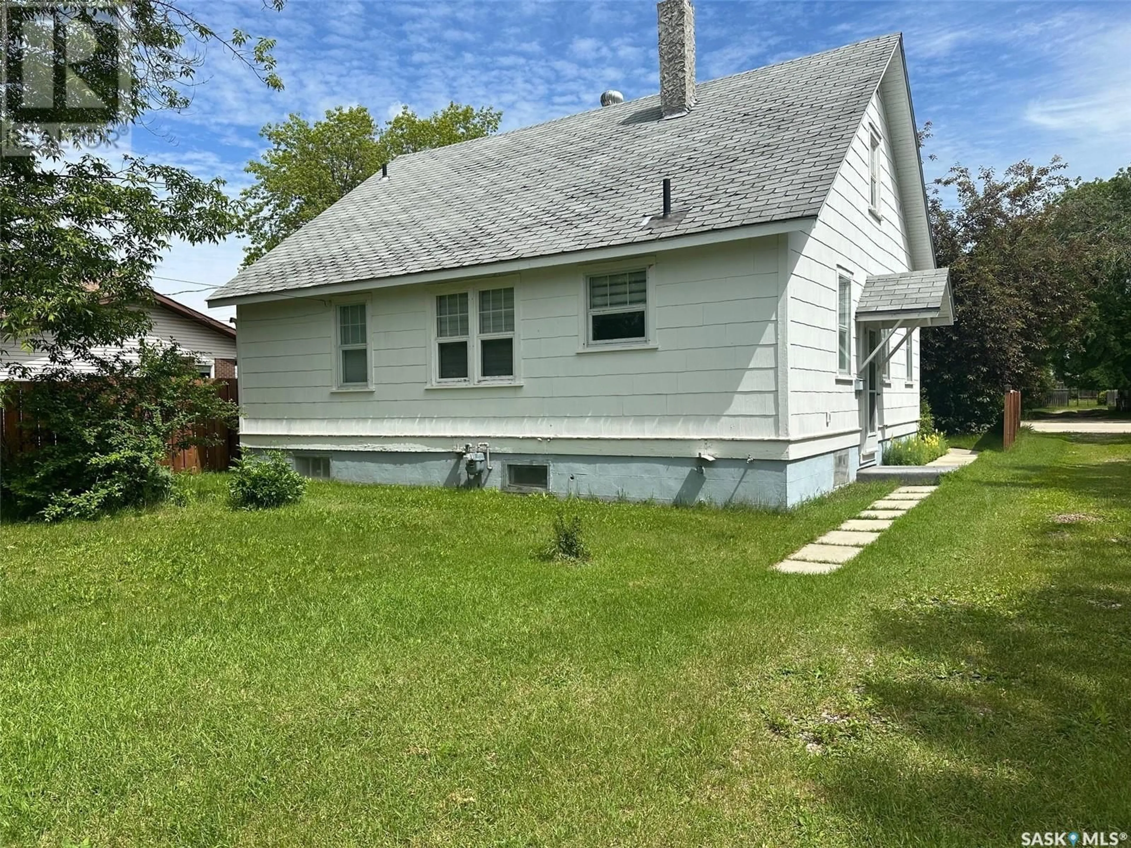 Home with vinyl exterior material, street for 221 MAIN STREET, Hudson Bay Saskatchewan S0E0Y0