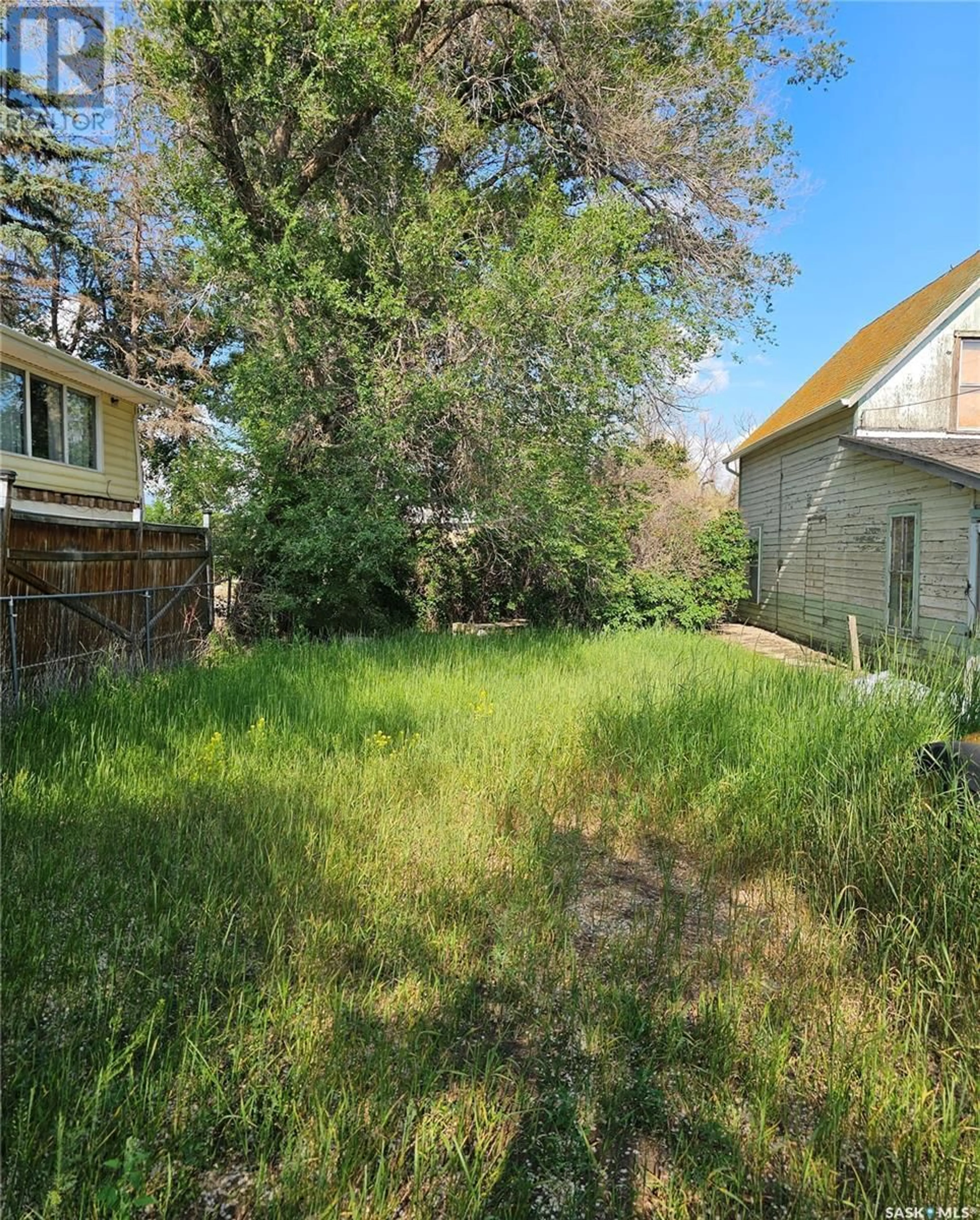 A pic from outside/outdoor area/front of a property/back of a property/a pic from drone, street for 58 3RD AVENUE, Swift Current Saskatchewan S9H2G2