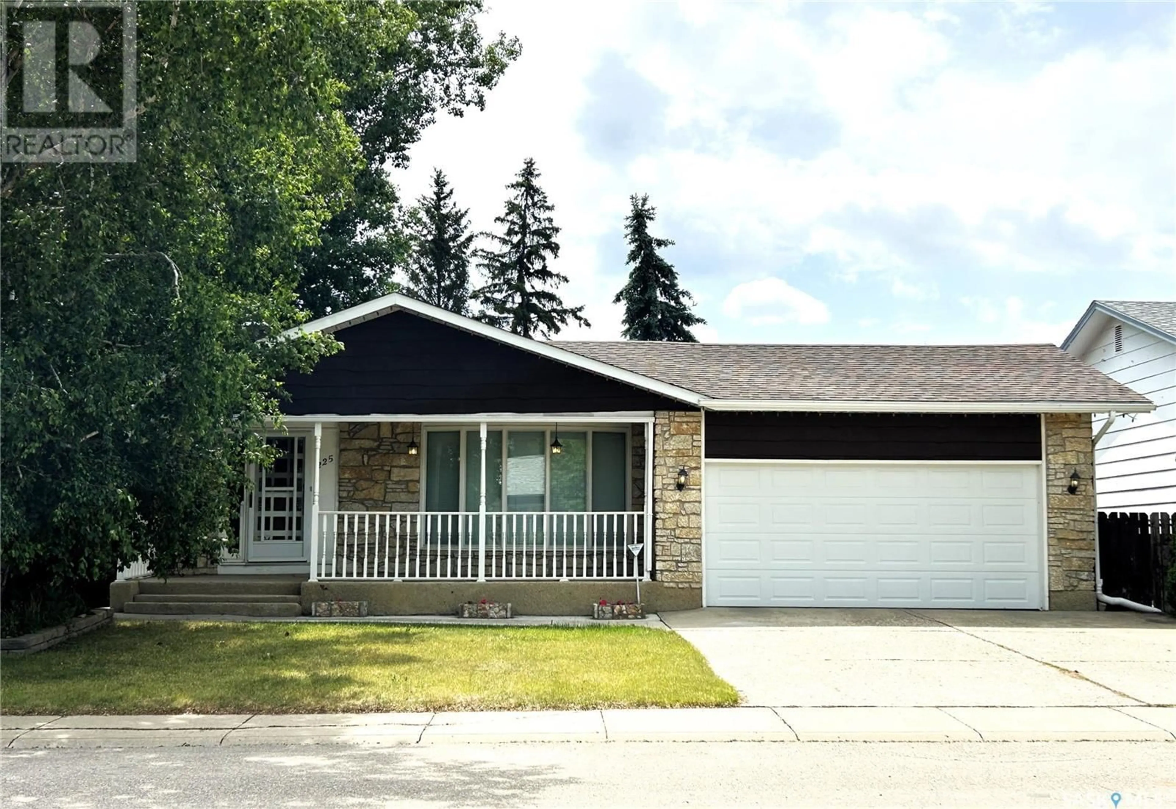 Home with vinyl exterior material, street for 225 COCKBURN CRESCENT, Saskatoon Saskatchewan S7L5S1