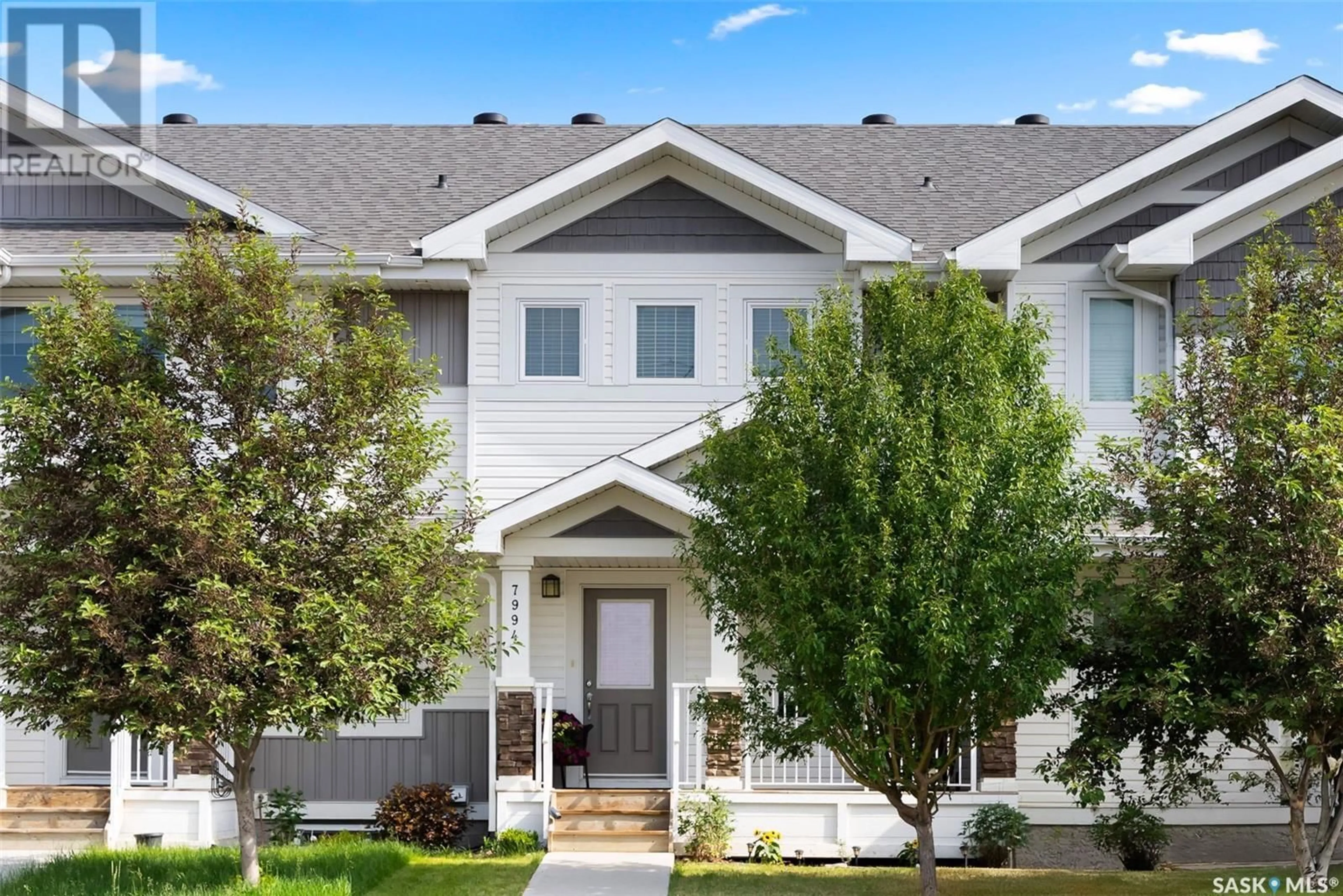 Home with vinyl exterior material, street for 7994 CANOLA AVENUE, Regina Saskatchewan S4Y0E8