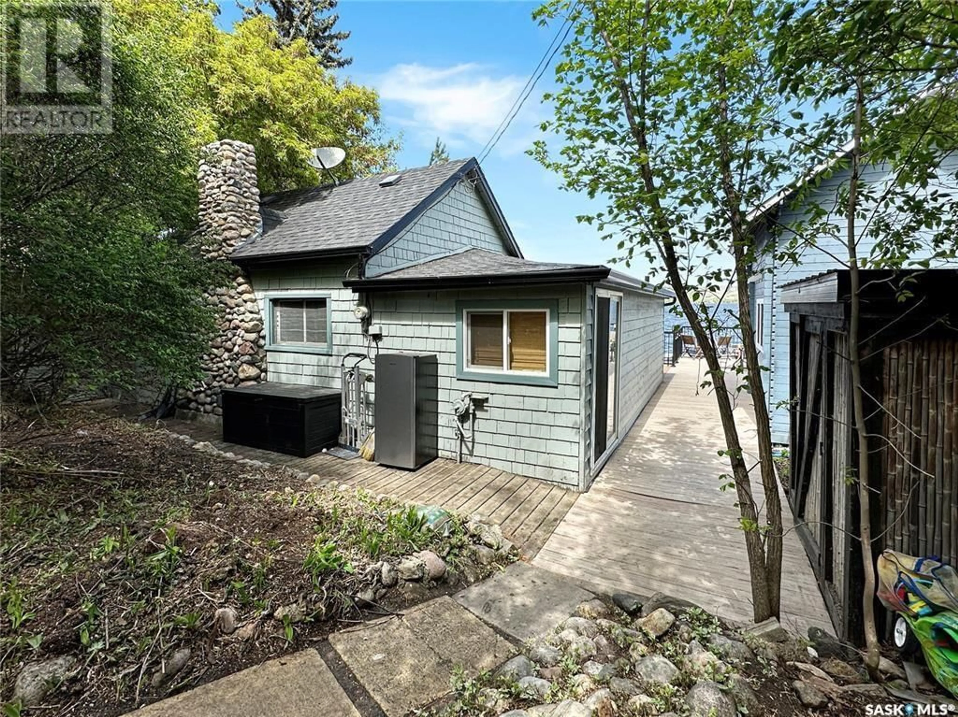 A pic from outside/outdoor area/front of a property/back of a property/a pic from drone, street for 111 B-SAY-TAH ROAD, B-Say-Tah Saskatchewan S0G1S0