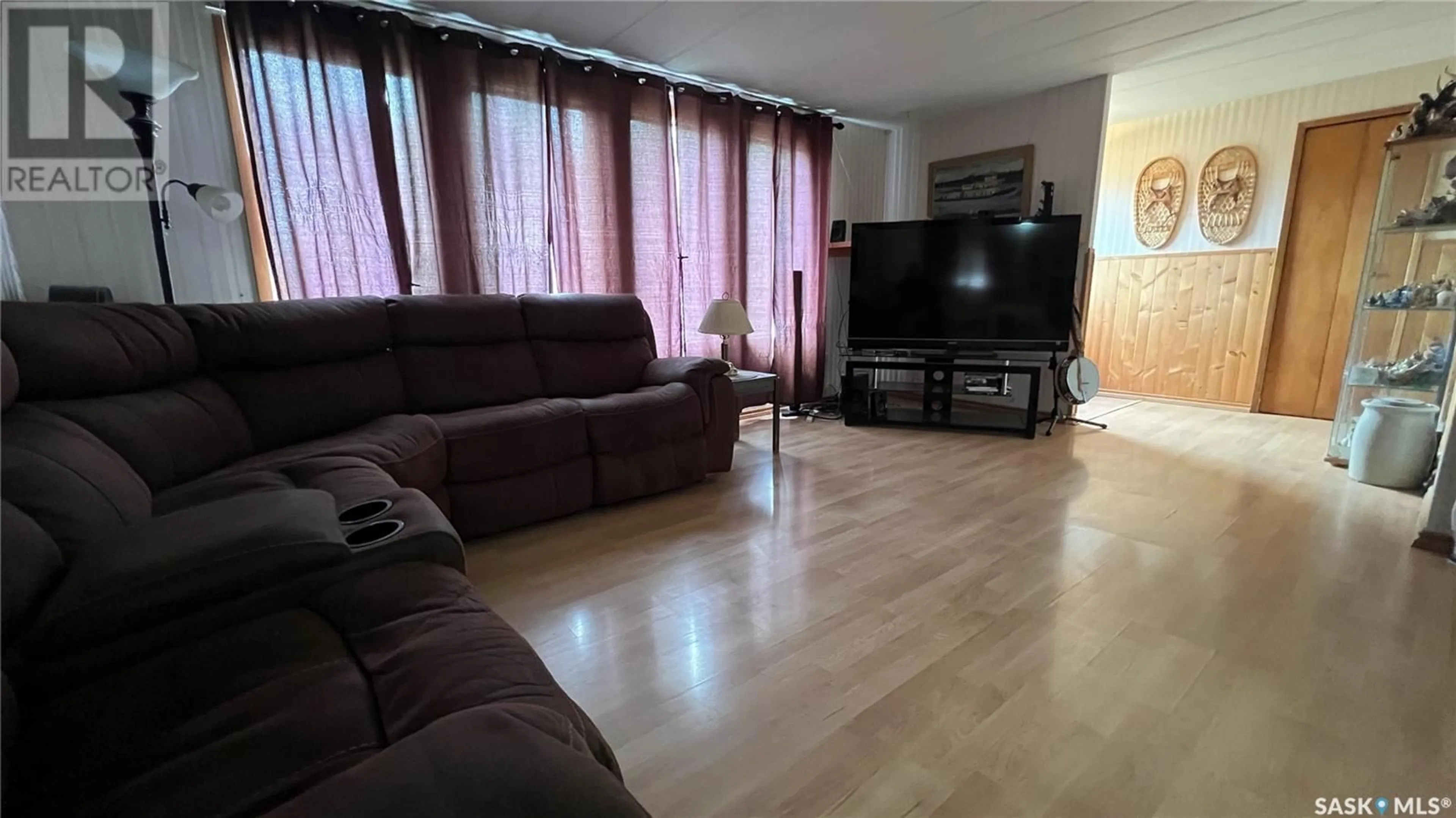 Living room with furniture, unknown for 404 3RD STREET, Wakaw Saskatchewan S0K4P0