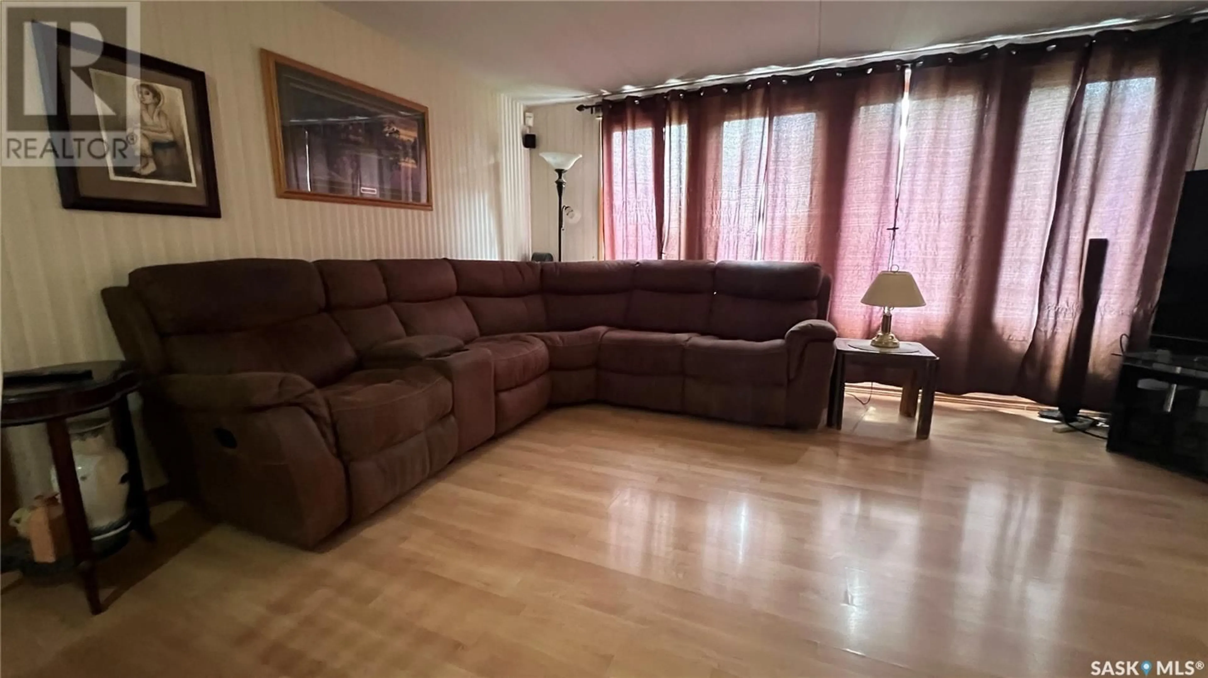 Living room with furniture, unknown for 404 3RD STREET, Wakaw Saskatchewan S0K4P0