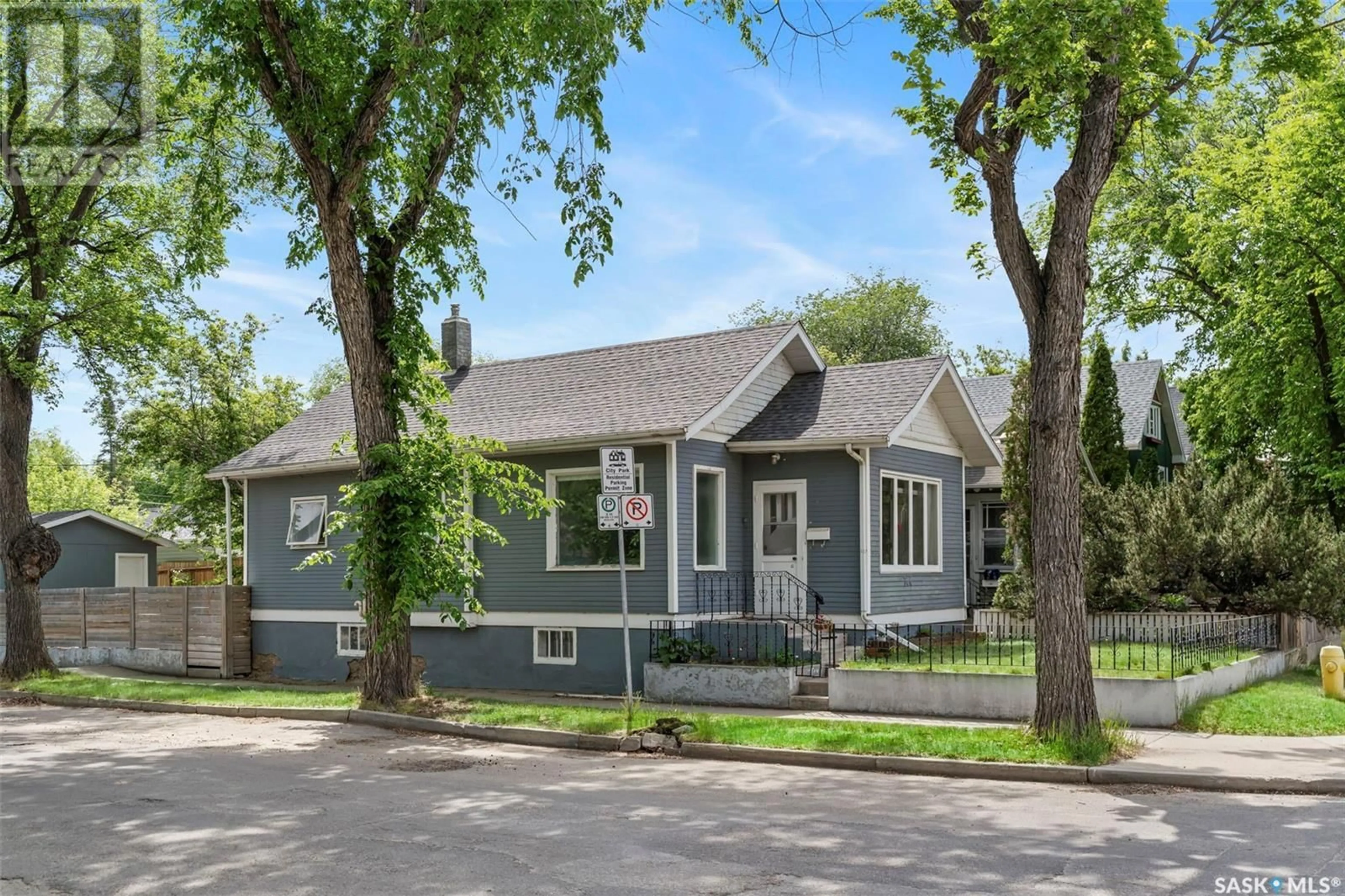 Home with vinyl exterior material, street for 744 7TH AVENUE, Saskatoon Saskatchewan S7K2V4