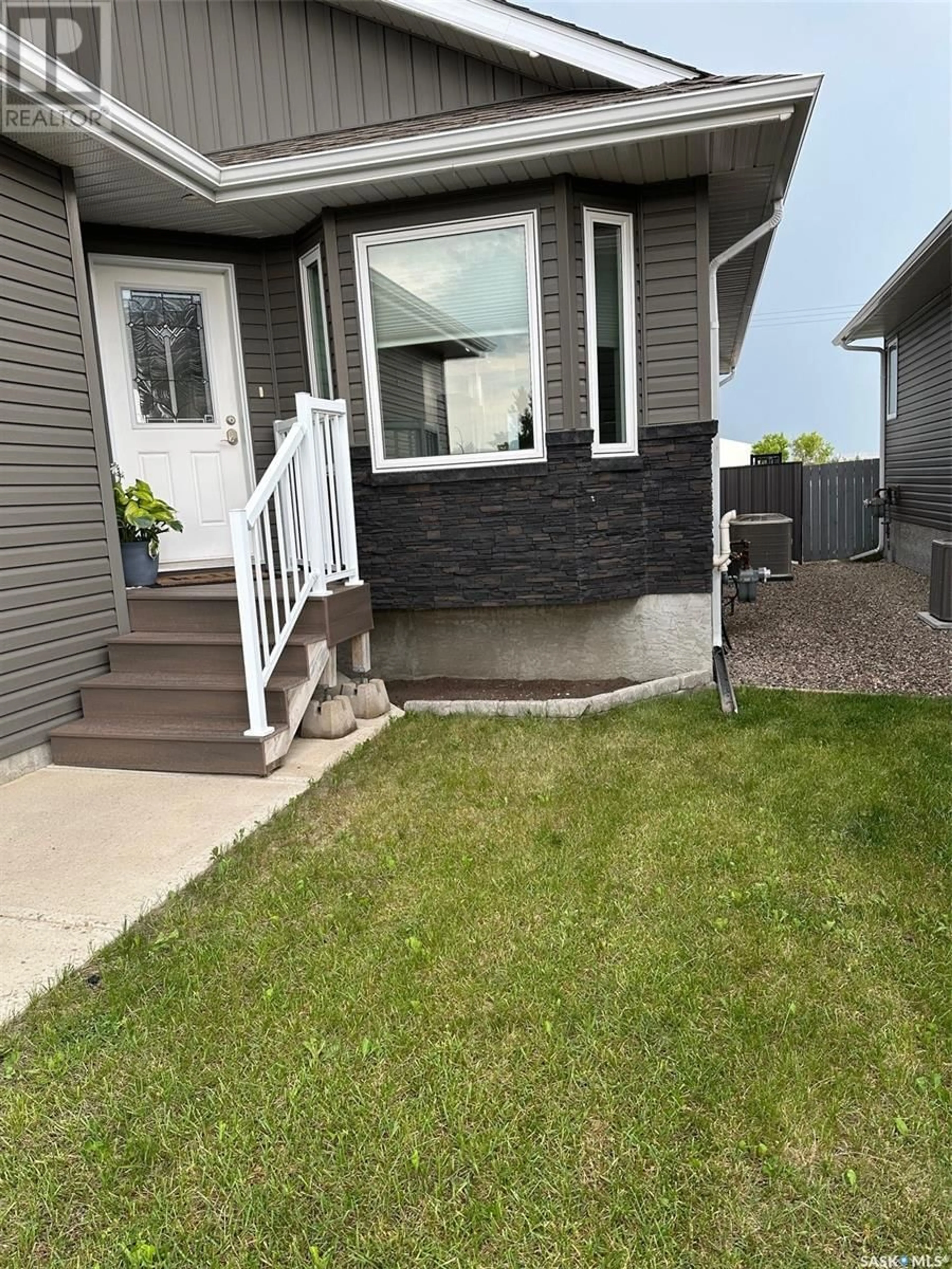 Home with vinyl exterior material, street for 408 SILLERS STREET, Estevan Saskatchewan S4A2Y9