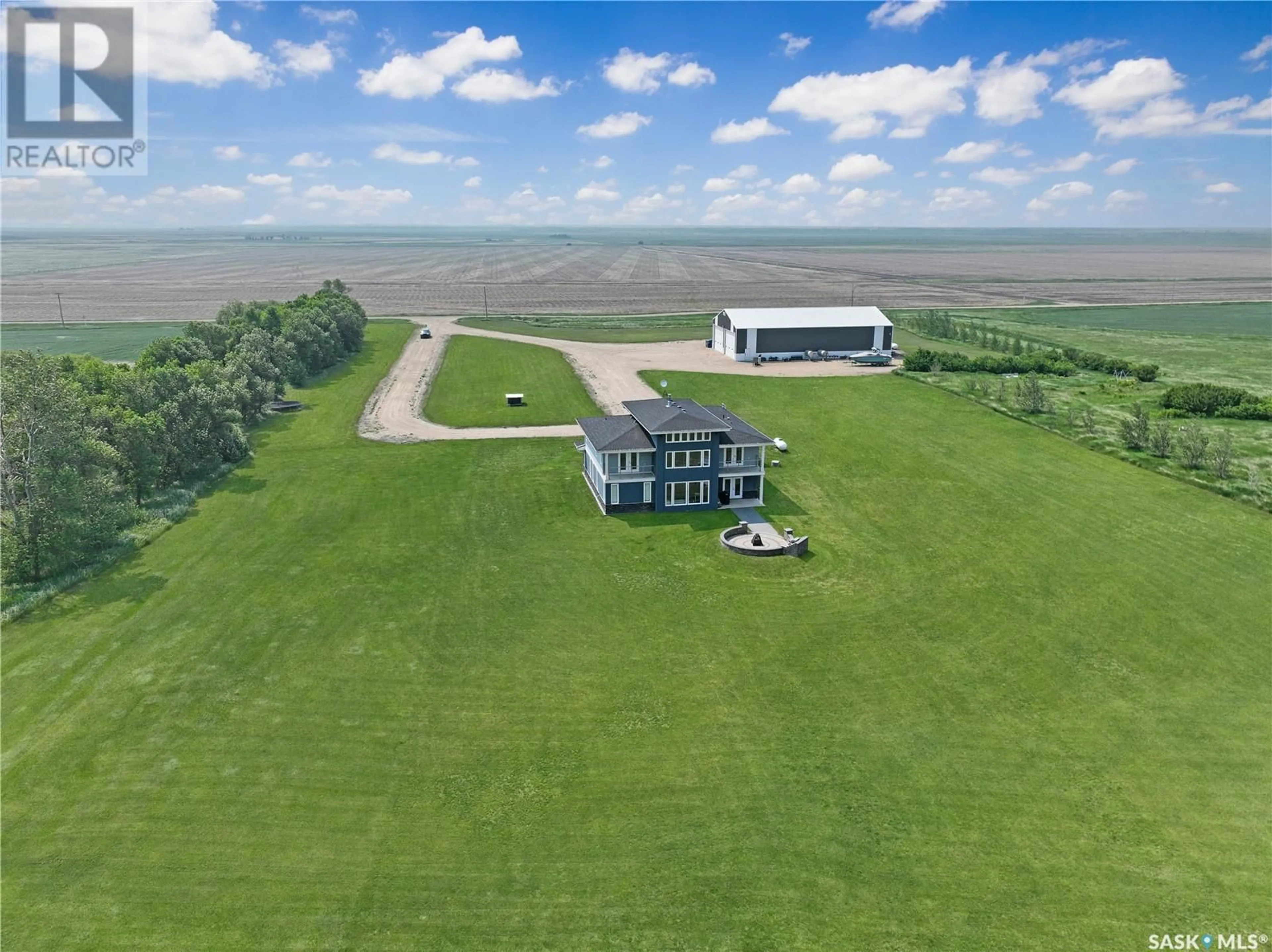 A pic from outside/outdoor area/front of a property/back of a property/a pic from drone, building for 13 HWY ESTATE, Brock Rm No. 64 Saskatchewan S0C1L0