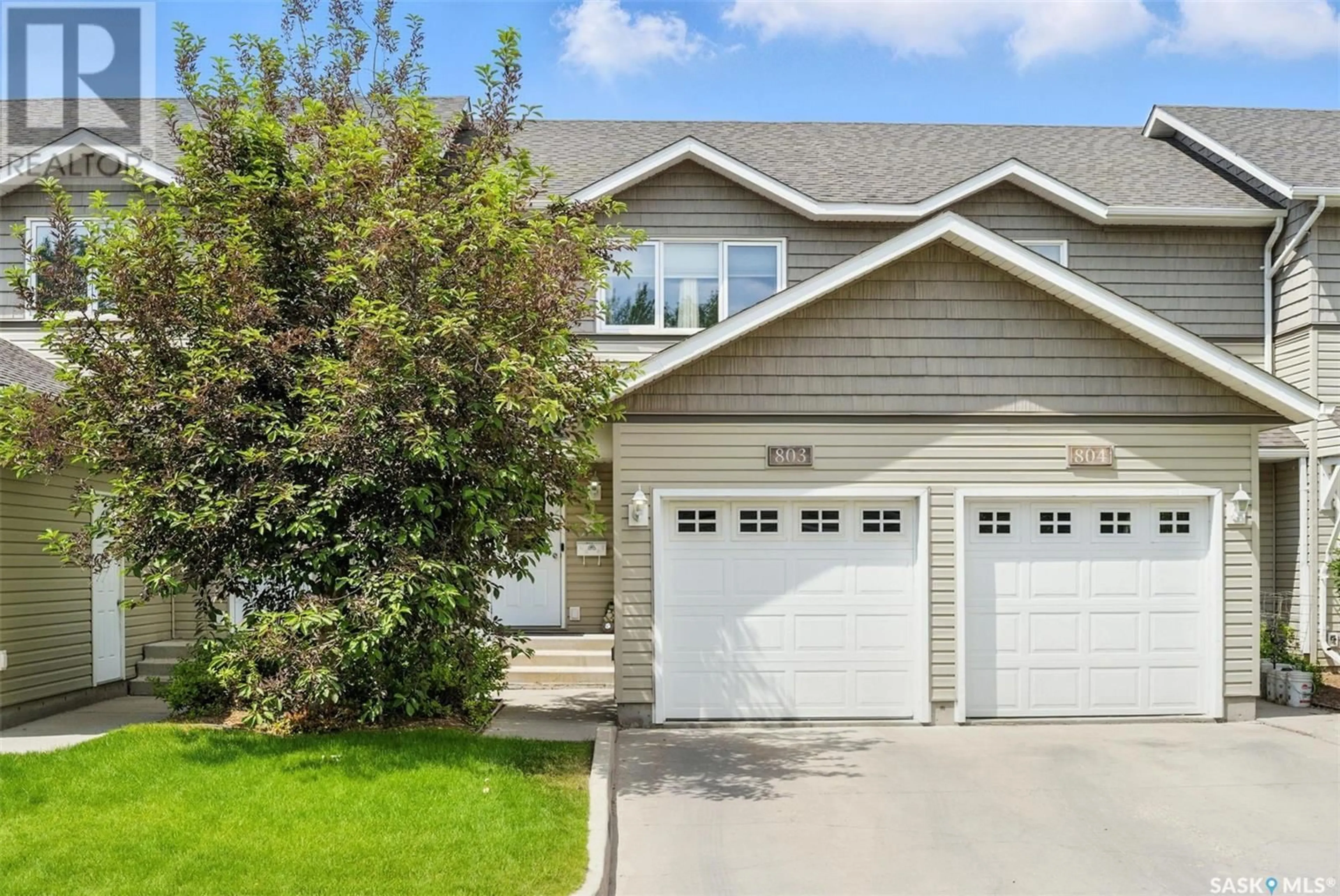 Home with vinyl exterior material, street for 715 - 803 HART ROAD, Saskatoon Saskatchewan S7M3Y7