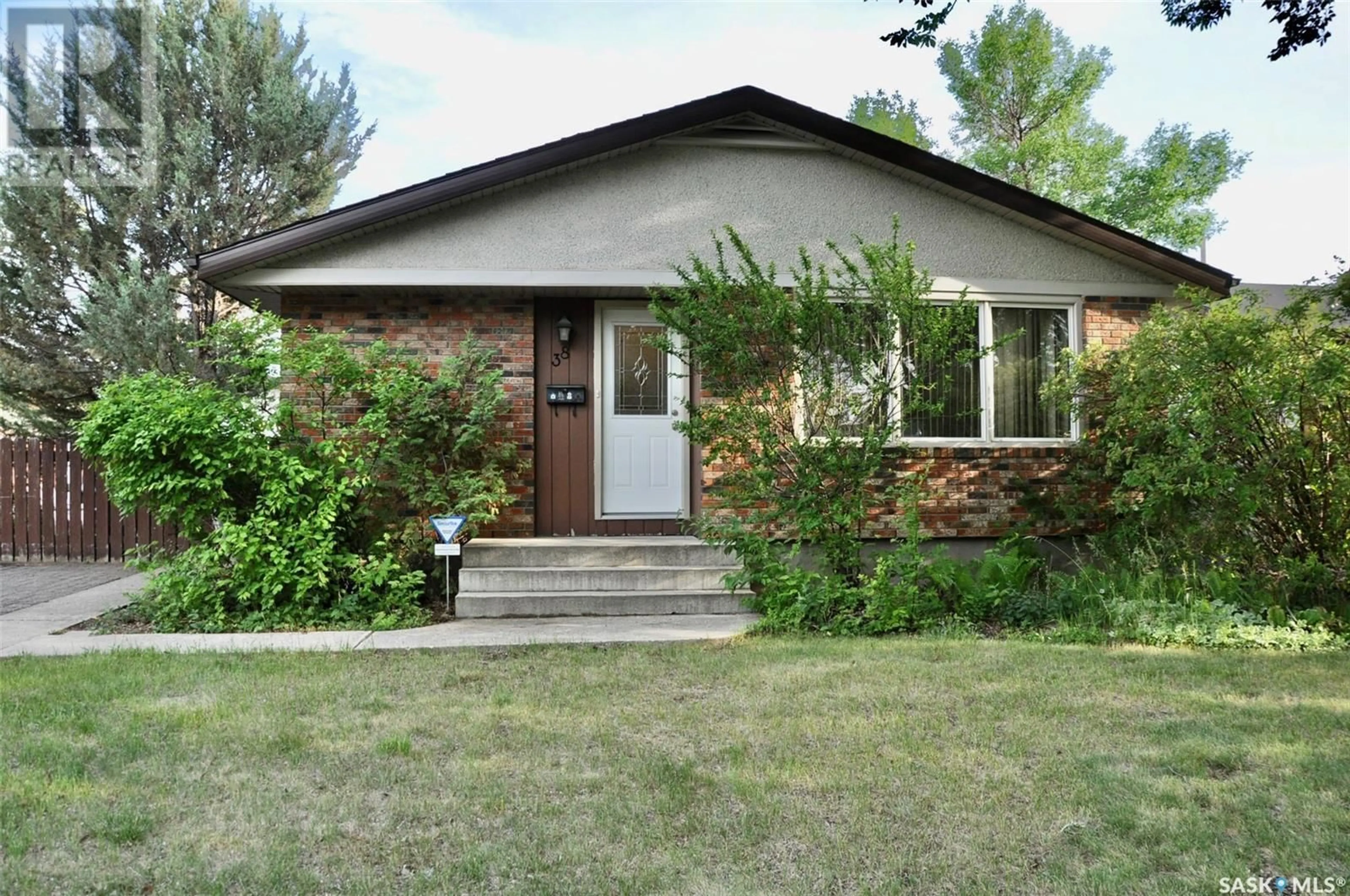 Home with brick exterior material, street for 38 LEDDY CRESCENT, Saskatoon Saskatchewan S7H3Y8