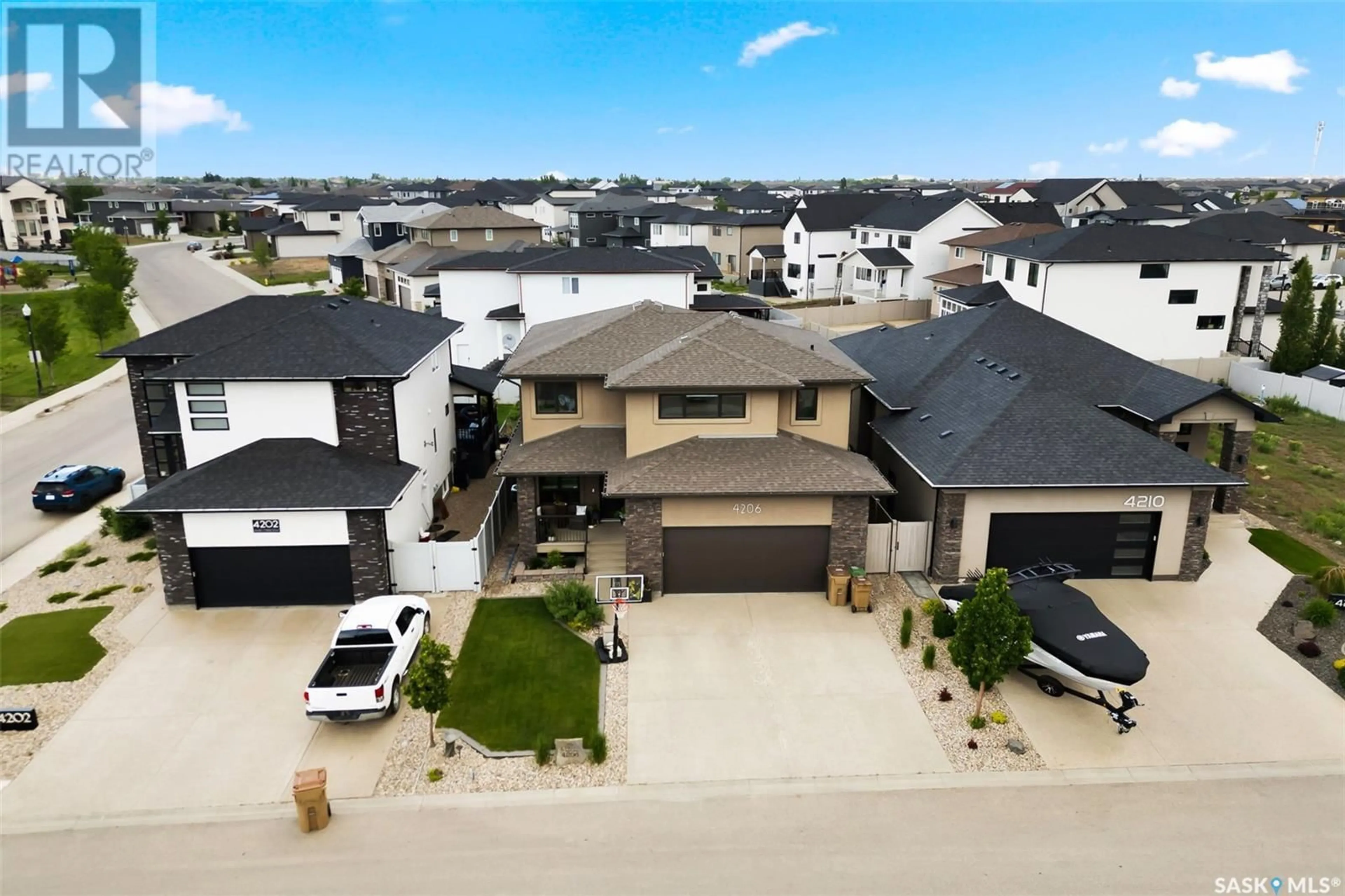 A pic from outside/outdoor area/front of a property/back of a property/a pic from drone, street for 4206 SAGE CRESCENT, Regina Saskatchewan S4V3L6