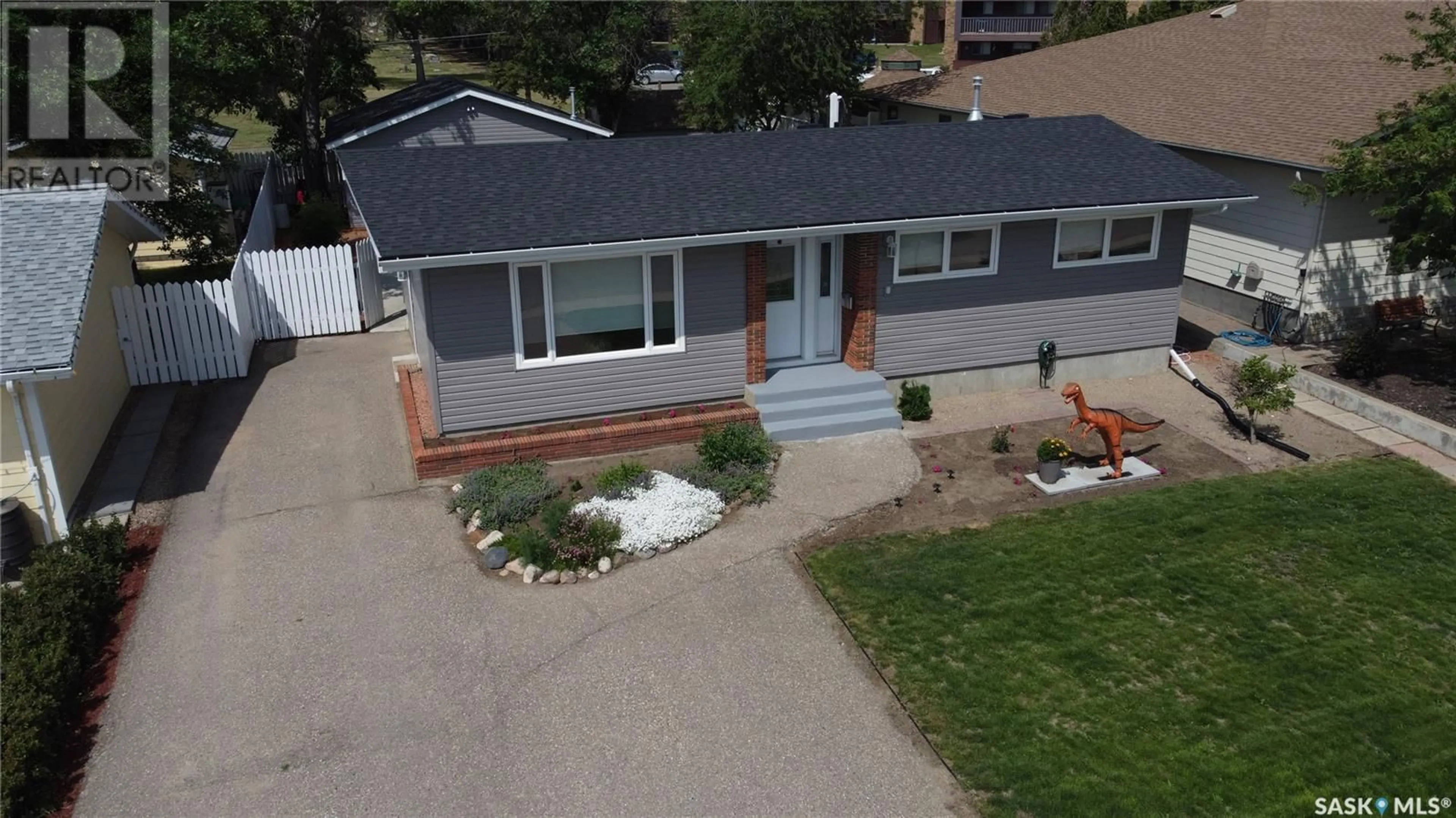 A pic from outside/outdoor area/front of a property/back of a property/a pic from drone, street for 1000 9TH AVENUE, Swift Current Saskatchewan S9H2S9