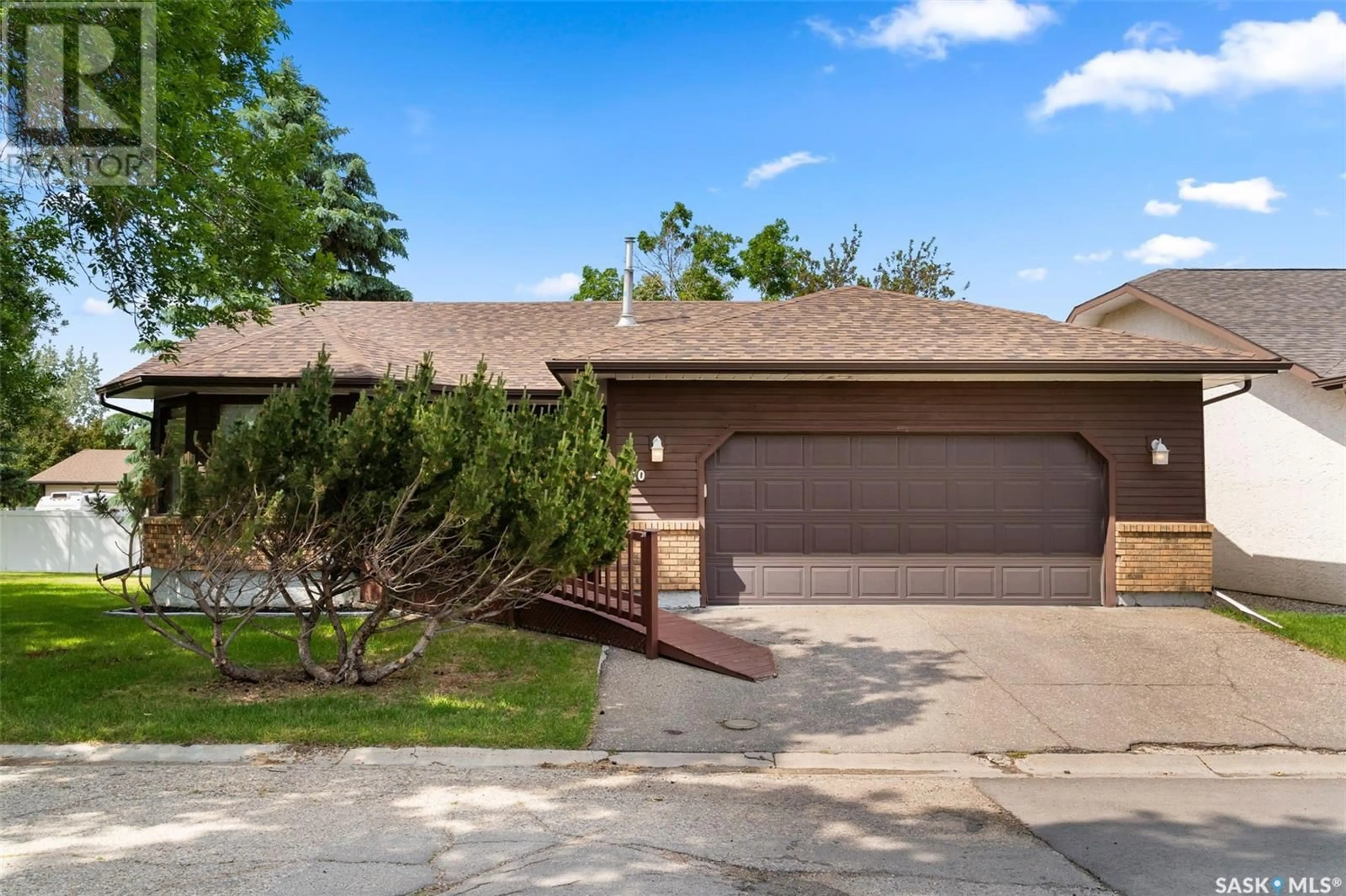 Home with brick exterior material, street for 80 GREENSBORO DRIVE, Regina Saskatchewan S4S7G1
