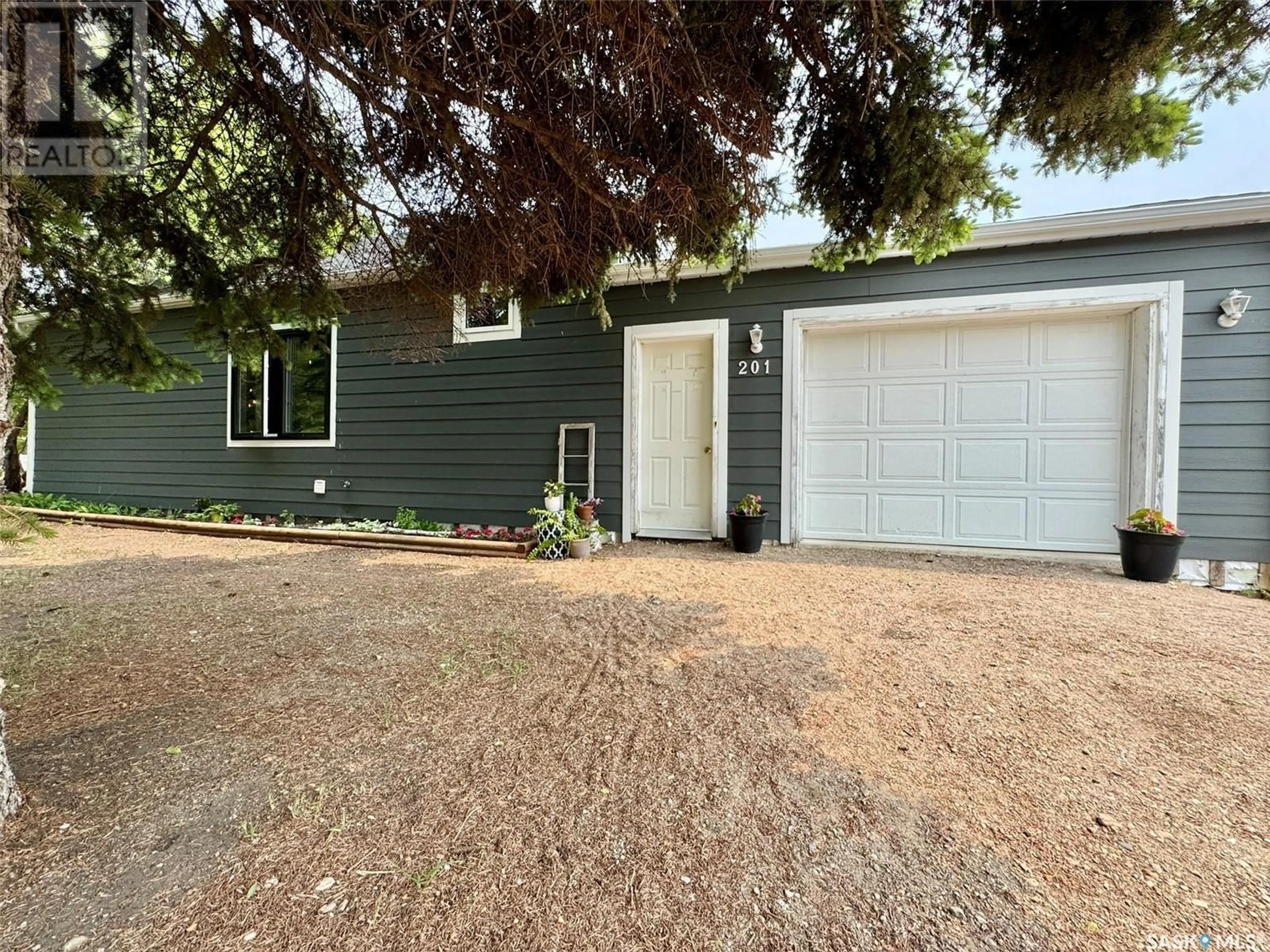 Home with vinyl exterior material, street for 201 ARUNDEL AVENUE, Bredenbury Saskatchewan S0A0H0