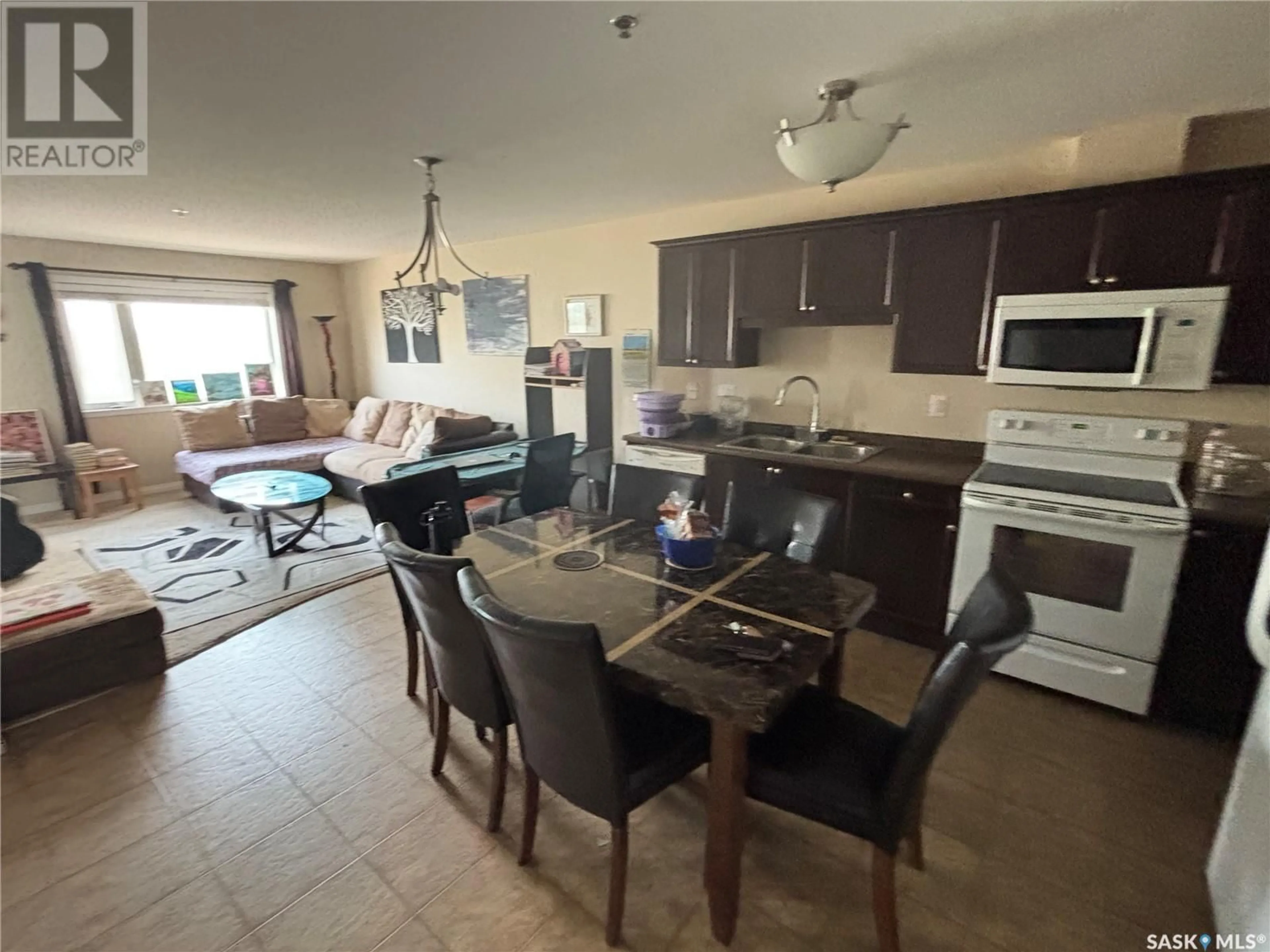 Open concept kitchen, ceramic/tile floor for 6202 112 WILLIS CRESCENT, Saskatoon Saskatchewan S7T0N3
