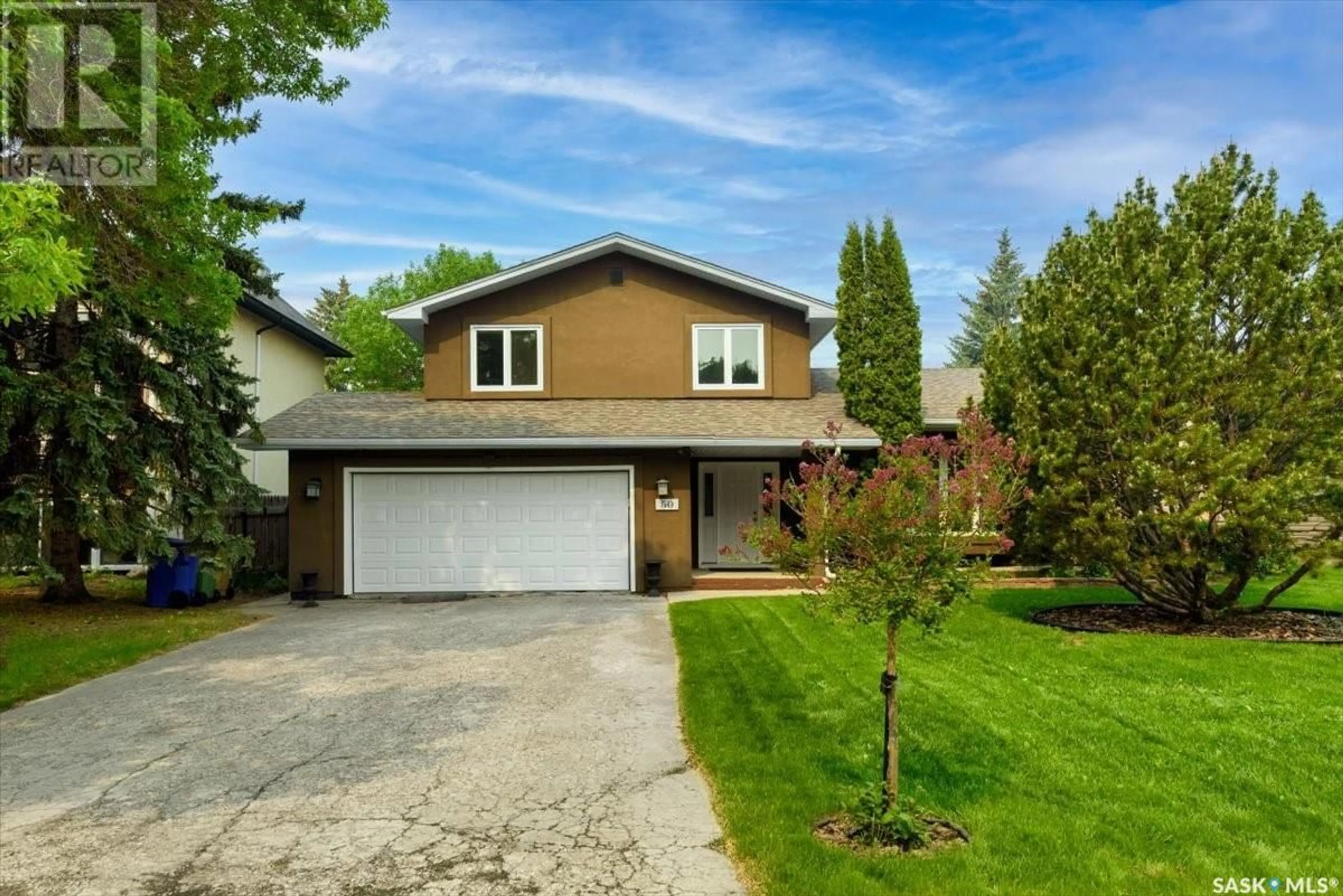 Home with vinyl exterior material, street for 50 LOWRY PLACE, Regina Saskatchewan S4S6C7