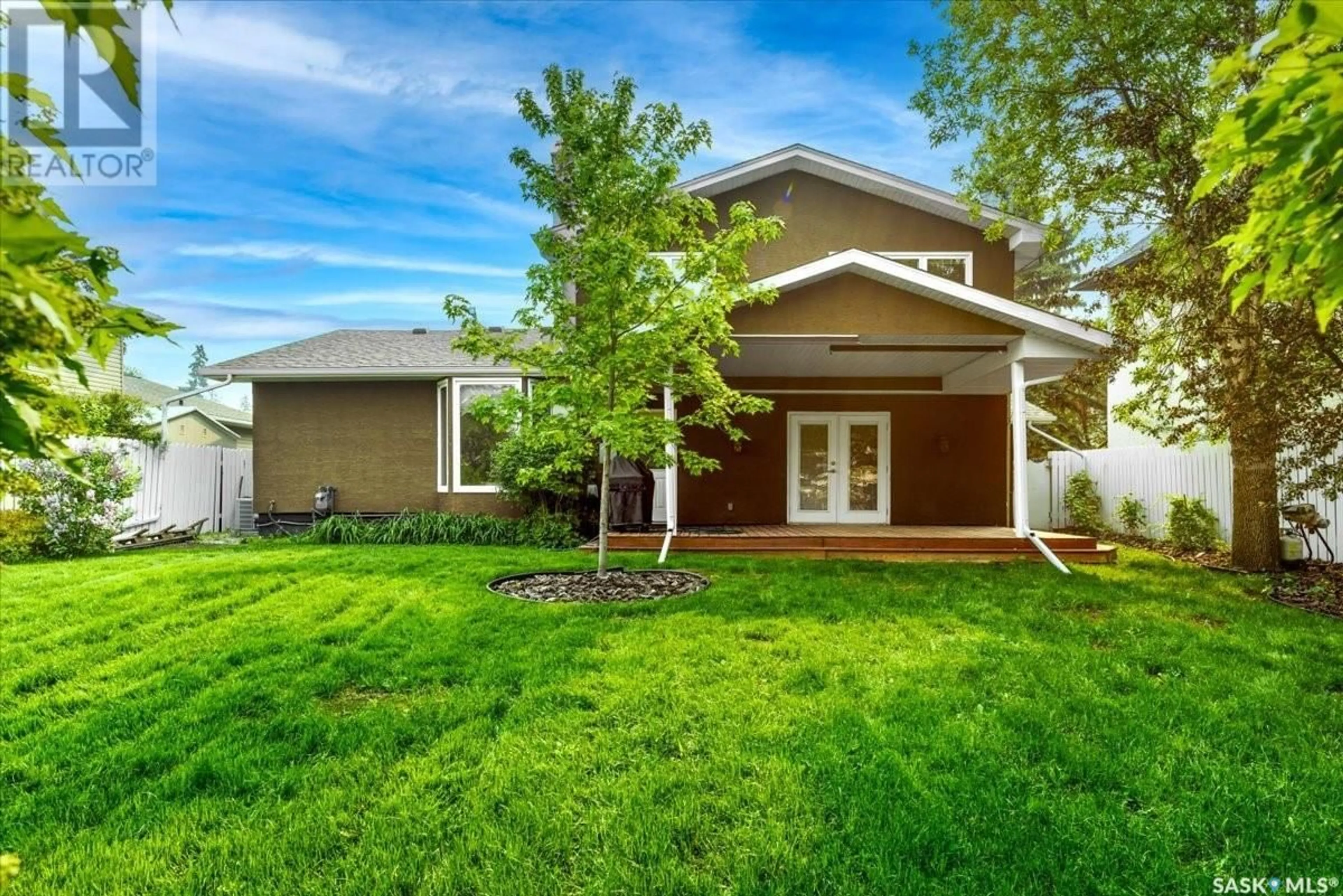 Home with vinyl exterior material, street for 50 LOWRY PLACE, Regina Saskatchewan S4S6C7