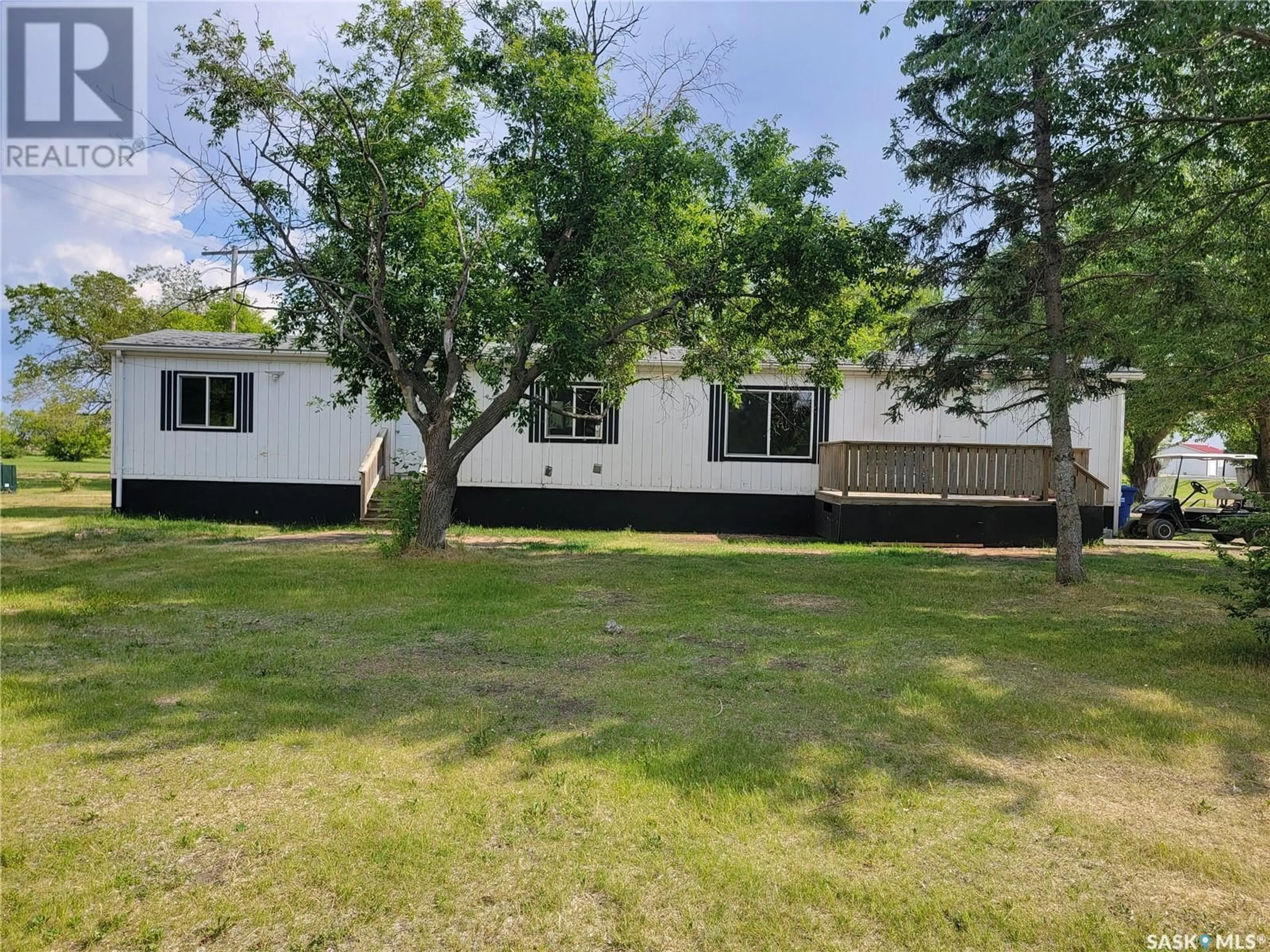 A pic from outside/outdoor area/front of a property/back of a property/a pic from drone, unknown for E - 27 600 5TH STREET, Unity Saskatchewan S0K4L0